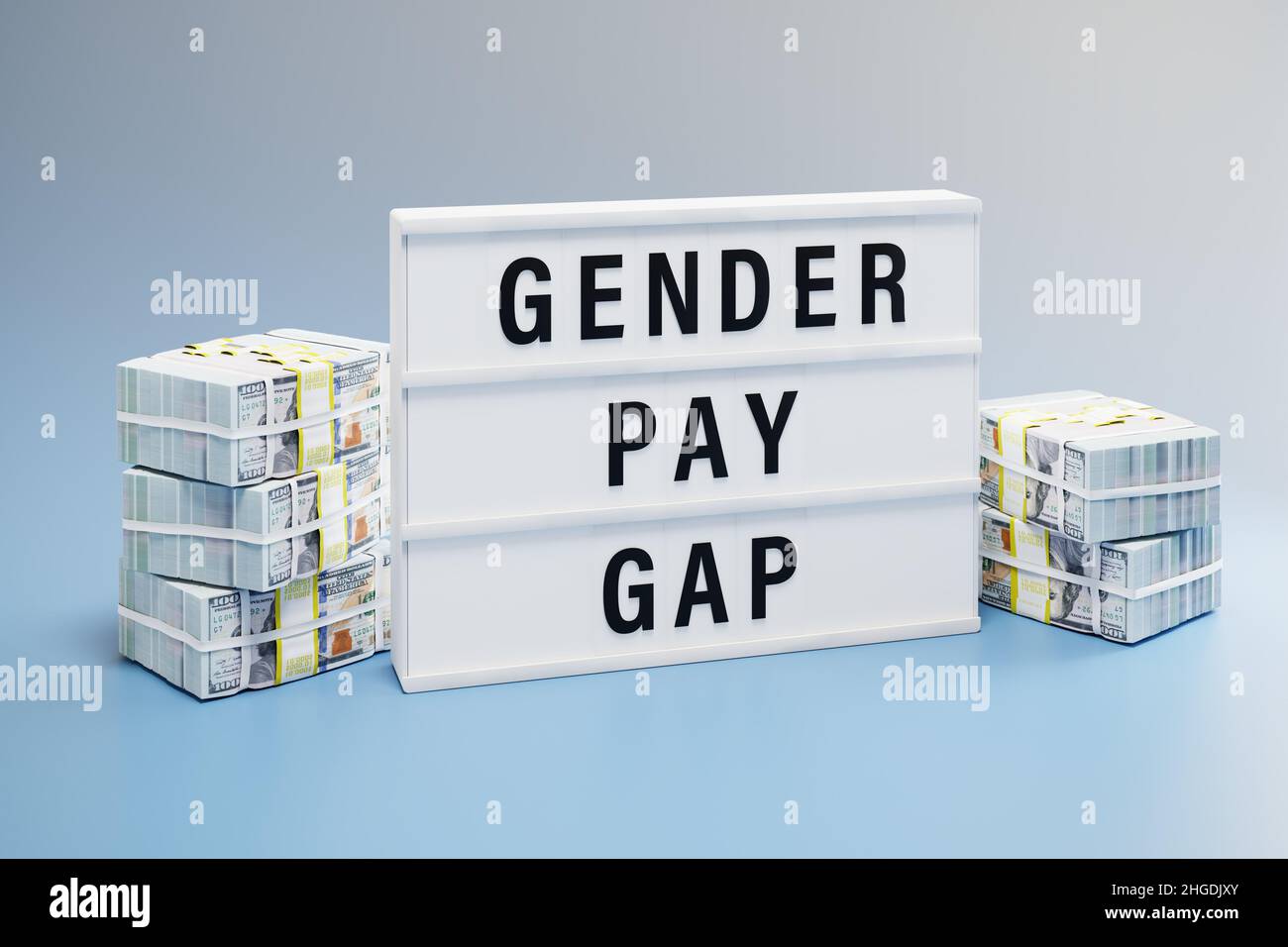 Gender Pay Gap Konzept: Zwei Haufen von 100-Dollar-Scheinen mit unterschiedlicher Höhe und ein Leuchtkasten mit den Worten 'Gender Pay Gap' dazwischen. Stockfoto