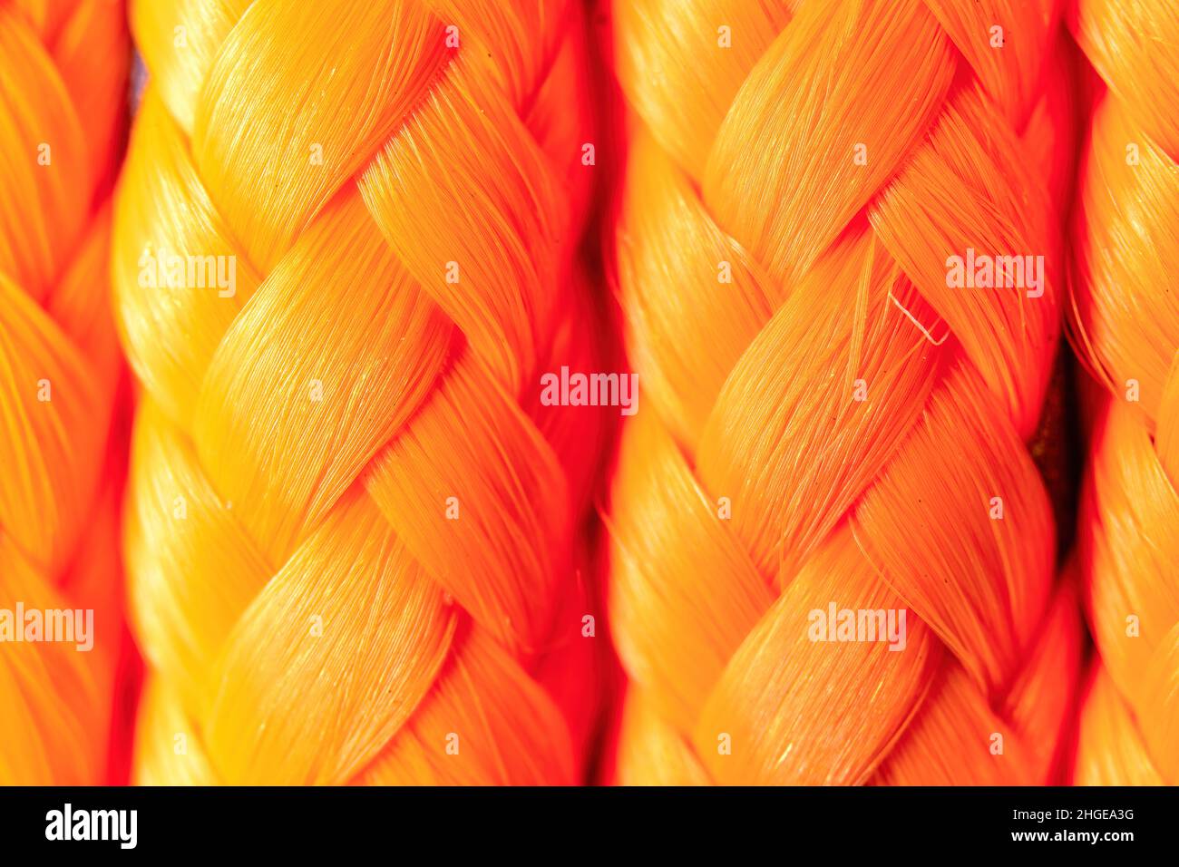 Makro eines orangefarbenen synthetischen Seils Stockfoto