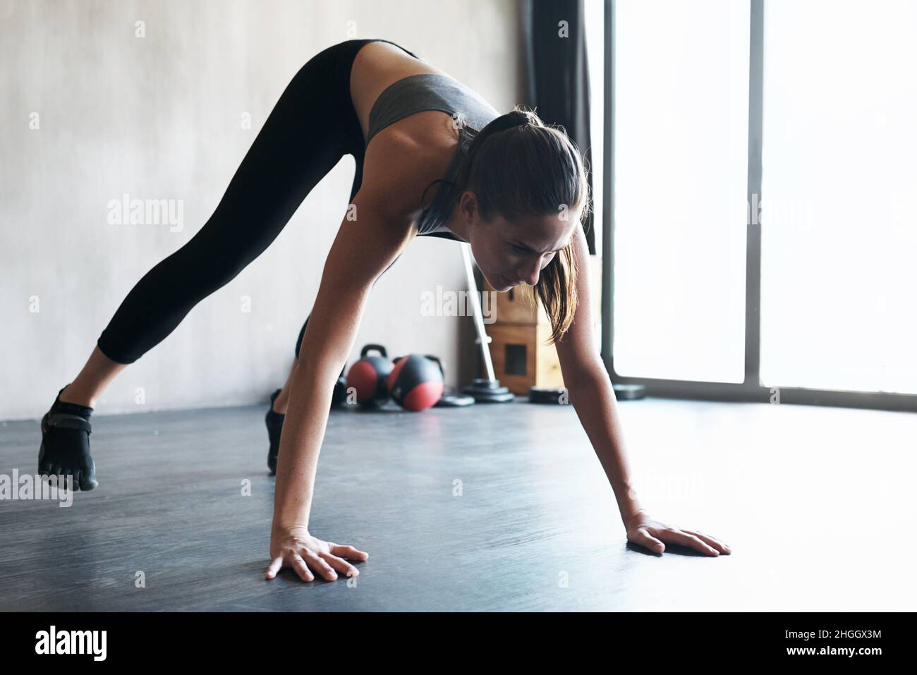 Formt den perfekten Körper mit intensiven Workouts Stockfoto
