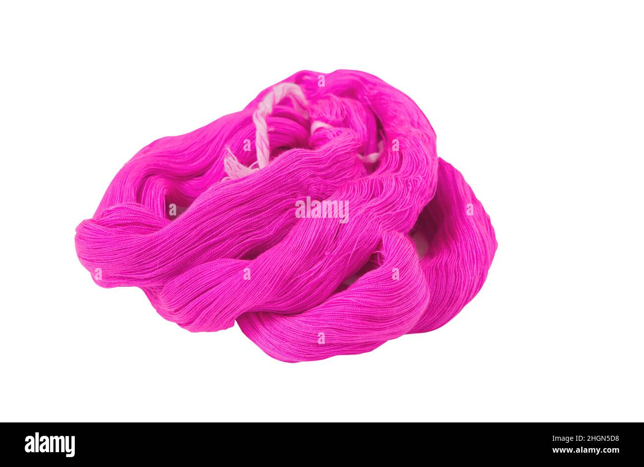 Bunte rosa Farbe Faden, Baumwolle Handwerk Fäden auf weißem Leinwand Hintergrund. Stockfoto