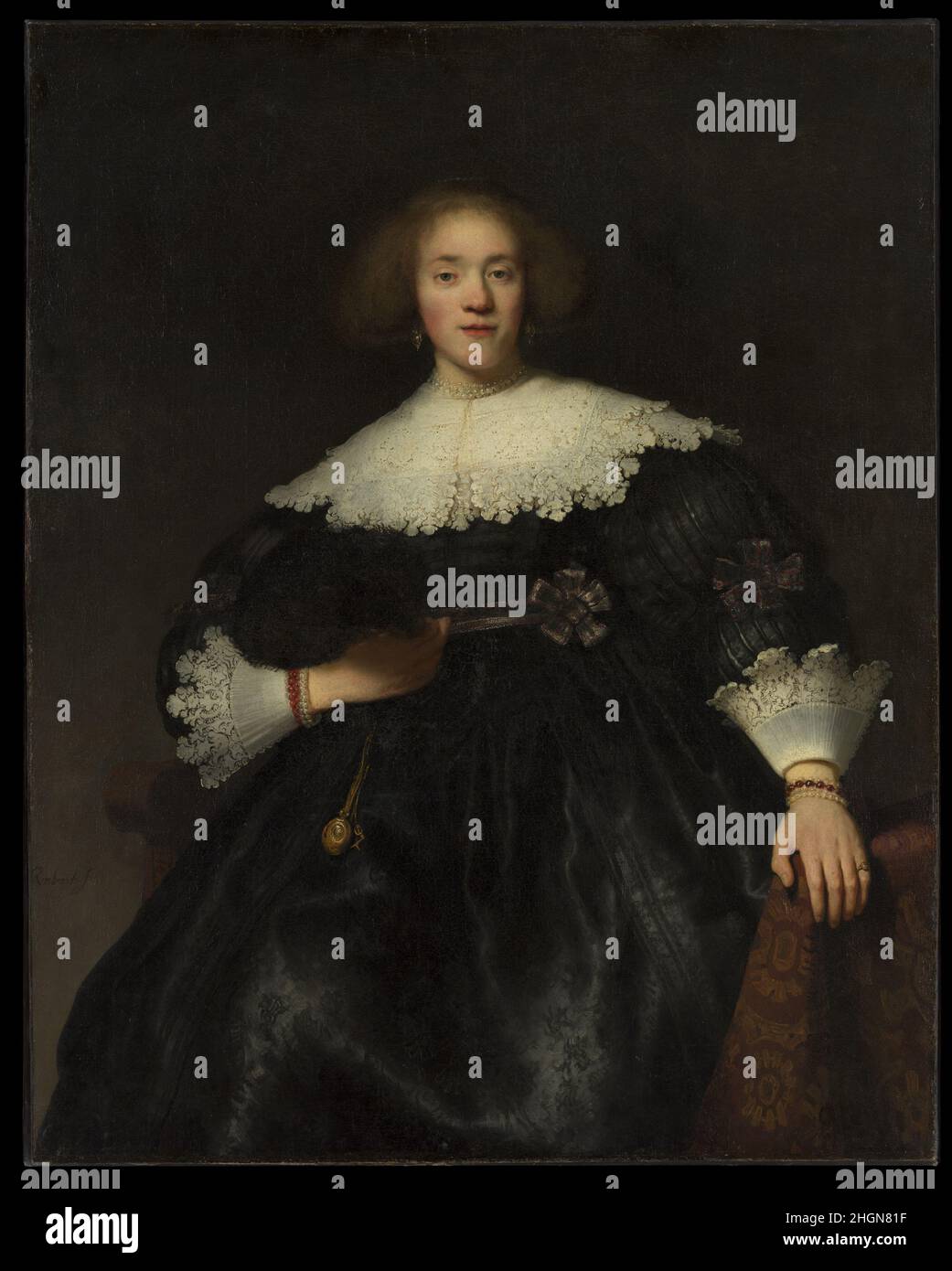 Porträt einer jungen Frau mit einem Fächer 1633 Rembrandt (Rembrandt van Rijn) Niederländisch Dieses animierte Porträt hat einen Anhänger, der den Mann des Sitters zeigt, der von einem Stuhl aufsteigt (Taft Museum, Cincinnati). Wenn sie zusammen gesehen werden, scheinen Ehemann und Ehefrau aufeinander zu reagieren, was diese zu den einfallsreichsten Kompositionen Rembrandts Anfang 1630s macht. Rembrandts frühe Erfahrung als Maler dramatischer Geschichtsszenen und sein tiefes Studium der Physiognomie und des Charakters während seiner Zeit in Leiden bereiteten ihn zum originellsten und erfolgreichsten Porträtisten in Amsterdam vor, wo er im Winter ankam Stockfoto