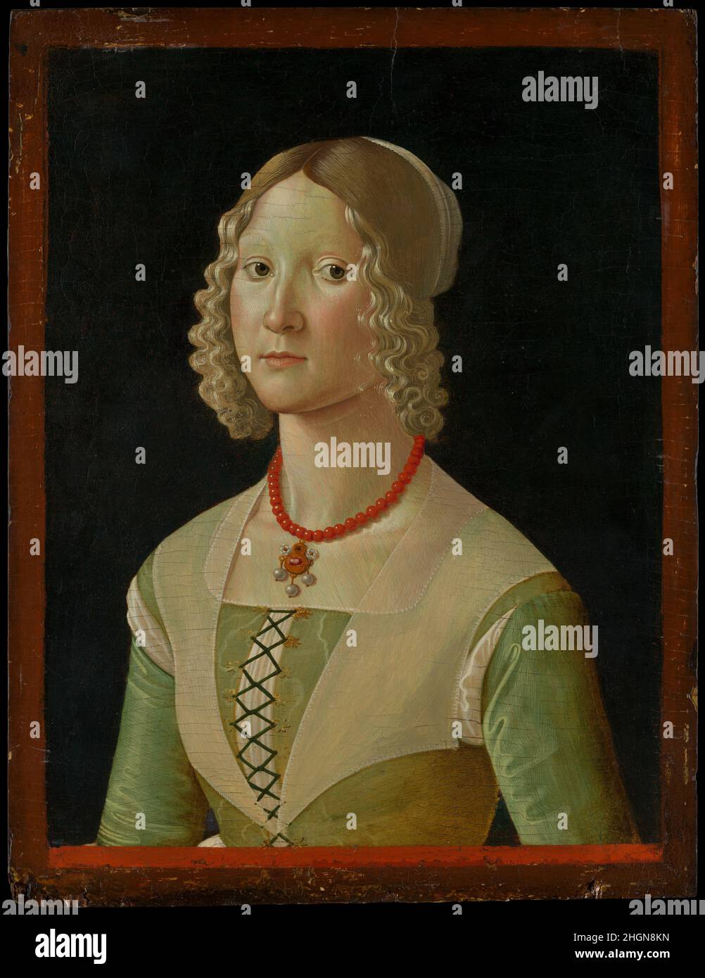 Selvaggia Sassetti (geb. 1470) ca. 1487–88 Davide Ghirlandaio (David Bigordi) Italienisch wahrscheinlich von Domenico Ghirlandaios Bruder Davide gemalt, wurde der Sitter dieses auffälligen Porträts als fünfte Tochter des Bankiers Francesco Sassetti identifiziert (er hatte insgesamt sieben Töchter). Der Anlass könnte ihre Heirat mit Simone d’Amerigo Carnesecchi im Jahr 1488 gewesen sein. Zu ihren wohlhabenden Kleidern gehören eine Korallenkette mit einem goldenen Anhänger mit einem roten Stein und drei Perlen. Die Dreiviertelansicht und die Art und Weise, wie die Büste abgeschnitten wird, wobei die Arme als Stützen fungieren, erinnern an geformte p Stockfoto