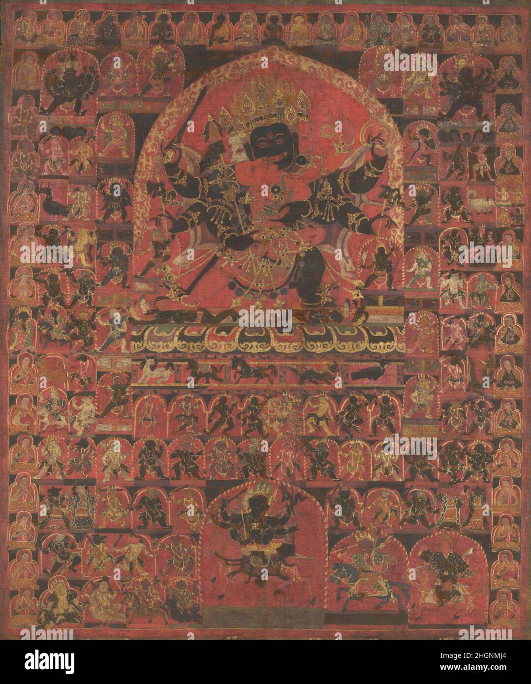 Bön-Gottheit Trowo Tsochog Khagying 15th Jahrhundert Tibet die Gottheit Trowo Tsochog Khagying (zornvoller höchster Herr, der im Himmel aufragt) wird von Anhängern der Bön-Religion verehrt, einer tantrischen Tradition ähnlich dem tibetischen Buddhismus, die sich aber durch ihre Betonung auf Opfer auszeichnet. Trowo Tsochog Khagying verkörpert unendliche Kraft und Wildheit und ist eine von fünf Festungsmeditationsgottheiten, die mit dem „Vater Tantras“ von Bon assoziiert sind. Er wird hier gesehen, wie er seine erbitterte Gemahlin, Khala Dugmo, umarmt und gemeinsam den Weg der spirituellen Befreiung freimacht. Wie viele Bön-Gottheiten ist er mit Tod und Co assoziiert Stockfoto