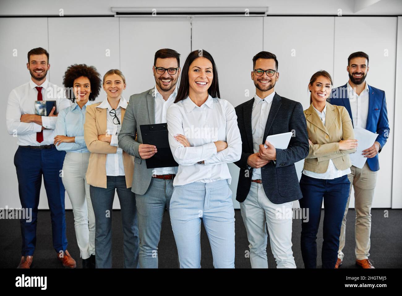 Erfolgreiches Geschäftsteam lächelt Teamwork Kollegen im Unternehmensbüro Stockfoto
