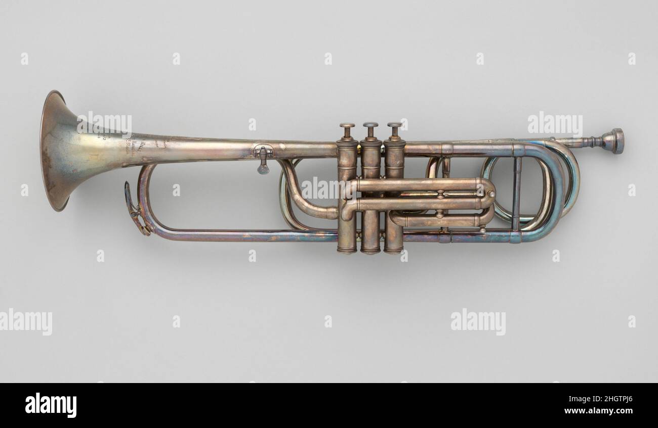Valve Trumpet in F 1881–85 Courtois & Mille French Diese Trompete hat Périnet-Ventile, die auf französischen Instrumenten der Zeit zwischen 1860 und 1920 üblich sind. Mit verschiedenen Gauner kann die Trompete in den Tonalitätstasten von F, E, E-Flat, D, C, Und B-Flat (A). Ventiltrompete in F. Französisch. 1881–85. Messing, versilbert. Paris, Frankreich. Aerophon-Lip Vibrated-Trompete / Posaune Stockfoto