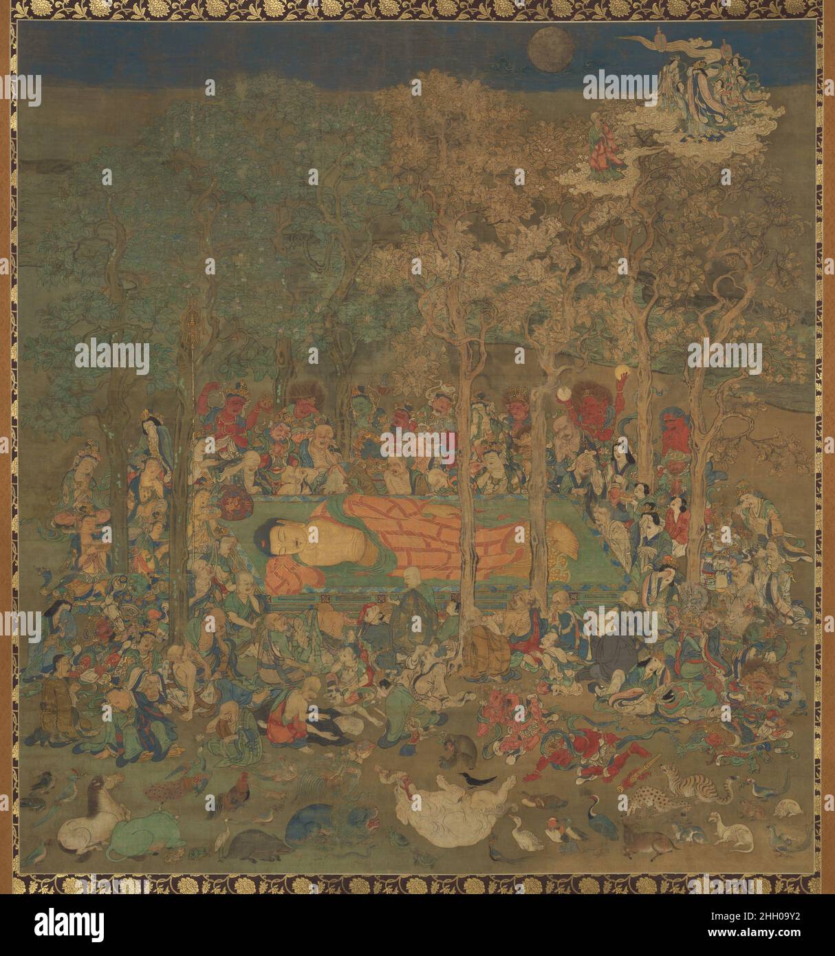 Tod des historischen Buddha (Nehan-zu) 14th. Jahrhundert Japan die wesentlichen Lehren des Buddhismus werden in Gemälden des Nirvana des Buddha Shakyamuni deutlich, seines Überganges vom irdischen Leben zum ultimativen Ziel eines erleuchteten Wesens: Befreiung von den Bindungen der Existenz durch Negation von Begierden, die das innere Leiden des Lebens verursachen. Nach einem langen Leben des Lehrens in einer letzten Trance nach Westen gerichtet, trägt der goldene Körper des Buddha die Zeichen seiner erleuchteten Natur. Kurze Locken, die seinen Kopf bedecken, deuten auf sein asketisches Leben hin, während längliche Ohrläppchen, die mit schwerem Schmuck geschmückt sind, seine Geburt als ein widerspiegeln Stockfoto