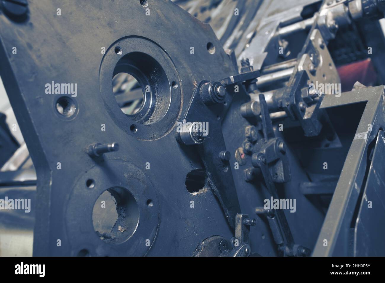 Teil einer eisernen industriellen Werkzeugmaschine. Stockfoto