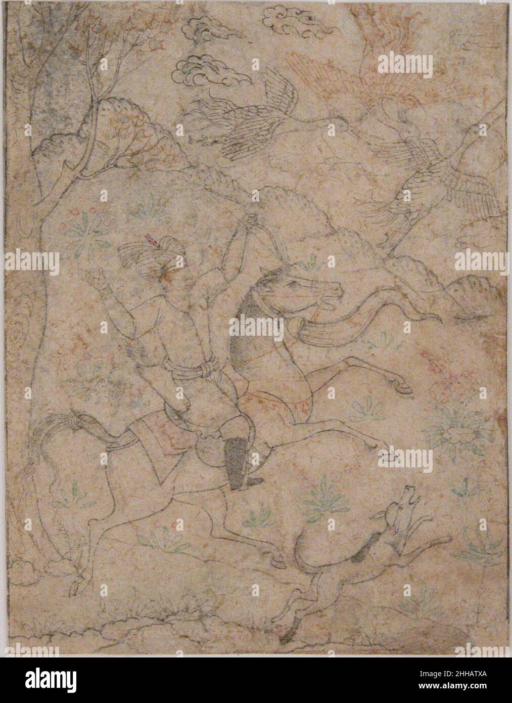 Berittene Jäger mit Hund, der Wildvögel verfolgt 16th. Jahrhundert die winzigen Löcher um die Figur dieses Jägers, der Wildvögel jagt, deuten darauf hin, dass diese Skizze als Abprall verwendet wurde, um das Bild auf ein anderes Werk zu kopieren. In islamischen Gemälden wurden aus bereits existierenden Skizzen wie diesem oft Stockfiguren, die Hof- oder Kampfszenen füllten, oder natürliche Elemente, die Landschaftshintergründe ausarbeiteten, in eine Reihe von Kompositionen kopiert. Löcher wurden um das zu kopierende Bild herum gestochen und auf ein darunter liegendes Papier übertragen, indem Kohle darüber gestaubt wurde. Berittene Jäger mit Hund Jagd Spiel Vögel 452758 Stockfoto