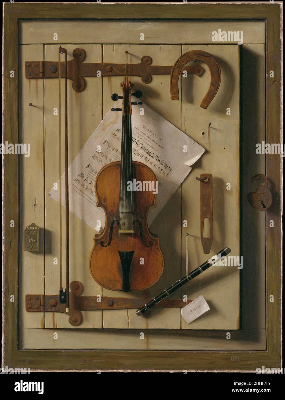 Stillleben – Violine und Musik 1888 William Michael Harnett Harnett war der imitierte und talentierteste Stillleben-Maler des späten 19. Jahrhunderts in Amerika, der für seine vielen Arrangements gefeiert wurde, die die Kunst des Trompe l’oeil (französisch für „Narr the eye“) an ihre Grenzen trieben. Diese komplexe Komposition mag zunächst flach erscheinen, ist aber voller Tiefe und Plastizität, was die Spannung zwischen Illusion und Realität betont. Die abgebildete Scharniertür ist leicht angelehnt, und die bescheidenen Objekte hängen auf markanten Nägeln und werfen starke Schatten. Die Instrumente und zerrissene Noten für eine beliebte irische Rolle und Stockfoto