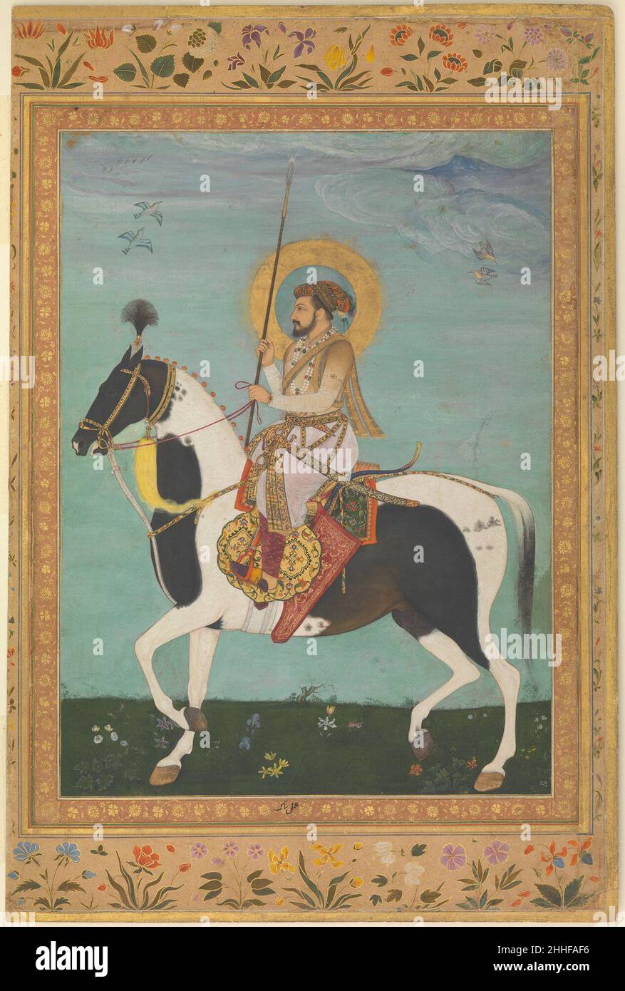 'Shah Jahan on Horseback', Folio aus dem Shah Jahan Album Verso: Ca. 1630; recto: Ca. 1530–50 Painting by Payag der Inder Payag arbeitete im Laufe einer bemerkenswert langen, siebenzehnjährigen Karriere für die Kaiser Akbar, Jahangir und Shah Jahan, und sein Bruder Balchand war auch ein talentierter Maler, mit dem er an einer Handvoll Gemälde mitarbeitete. Die Zuordnung dieses Porträts zu Payag, geschrieben in der Grenze unter dem Gemälde von Shah Jahan, wurde kürzlich durch die Entdeckung einer mikroskopischen Signatur auf der goldenen Spitze des Kaiserbogens bestätigt. „Shah Jahan auf dem Pferderennen“, Folio vom Shah Stockfoto