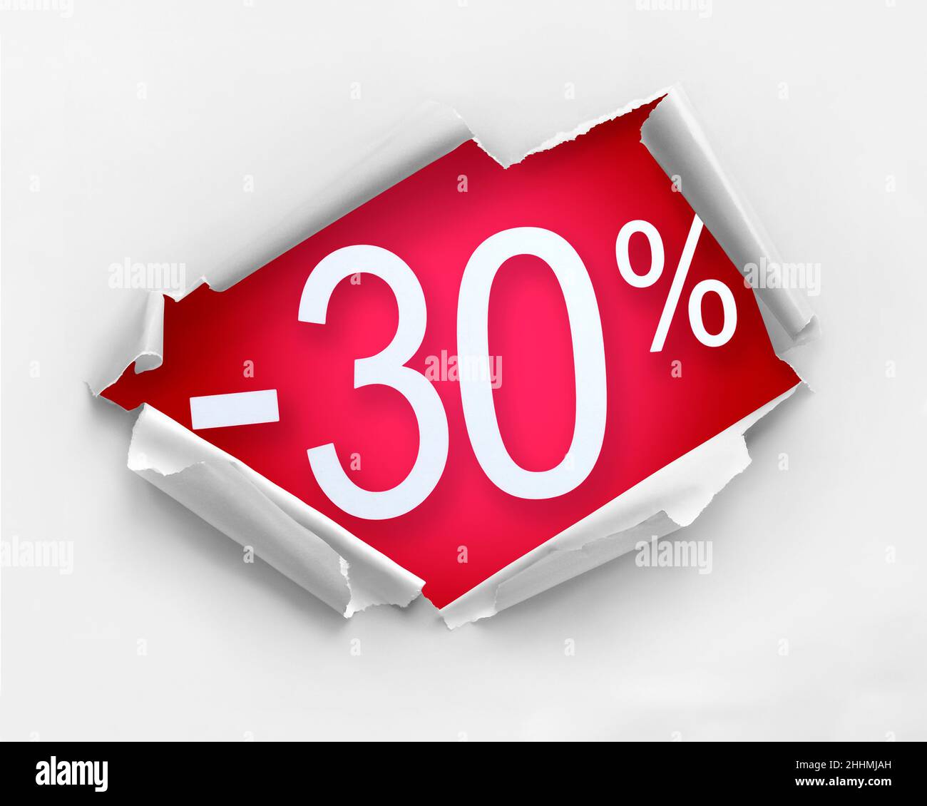 Weißes Loch riss Papier gegen 30 Prozent Rabatt Nachricht in roter Farbe Stockfoto