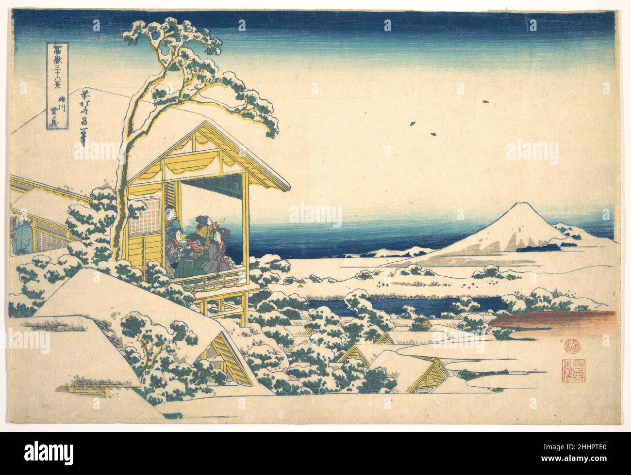 Morgen nach dem Schnee in Koishikawa in Edo (Koishikawa yuki no ashita), aus der Serie sechsunddreißig Ansichten des Mount Fuji (Fugaku sanjūrokkei) ca. 1830–32 Katsushika Hokusai Japanisch eine Kellnerin zeigt Fuji von einem Teehausbalkon aus einer Gruppe von Besuchern. Die rechteckige Veranda, in der sie eingeschlossen sind, fungiert als „Bild innerhalb eines Bildes“, eine kleinere, isolierte Komposition, die für sich allein stehen kann, die aber gewöhnlich etwas entscheidendes für die Erfahrung des Betrachters mit der Arbeit hinzufügt. In diesem Druck ergreift die isolierte Szene der bunten Figuren unsere Aufmerksamkeit und durch die Zeigegeste von t Stockfoto