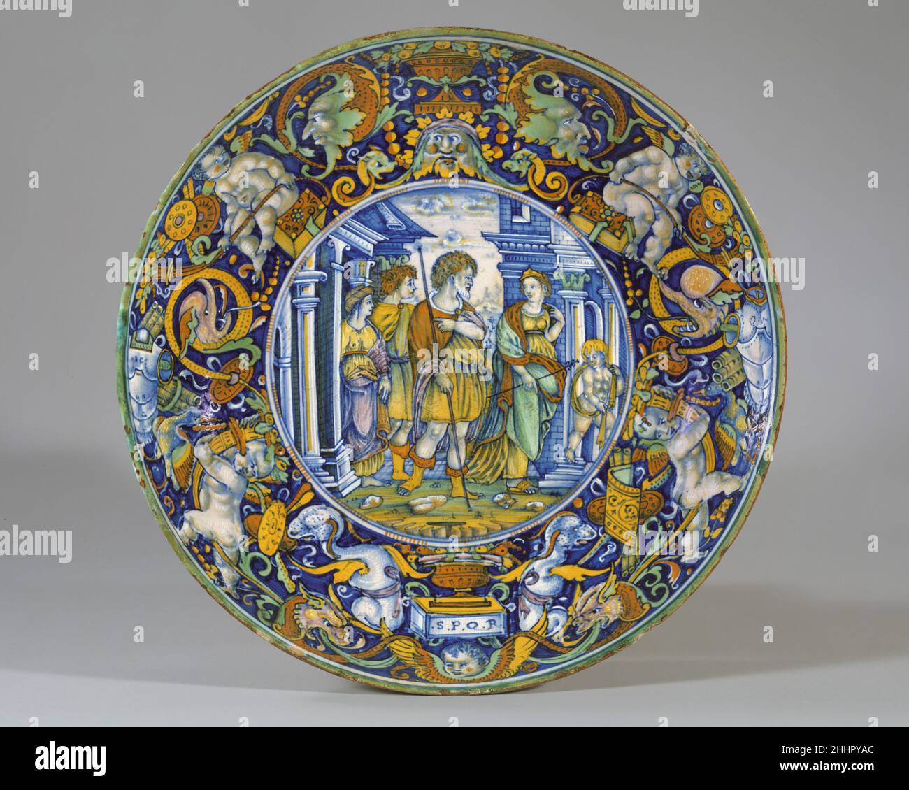 Dish (coppa): Die Geschichte von Aeneas: Königin Dido von Karthago begrüßt Aeneas und seinen Sohn. Ca. 1520 evtl. Werkstatt von Giovanni Maria Vasaro. Gericht (coppa): Die Geschichte von Aeneas: Königin Dido von Karthago begrüßt Aeneas und seinen Sohn. Möglicherweise Werkstatt von Giovanni Maria Vasaro (Italienisch (Castel Durante), aktiv Anfang 16th Jahrhundert). Italienisch, Castel Durante. Ca. 1520. Maiolica (Zinnglasierte Steinwaren). Keramik-Keramik Stockfoto