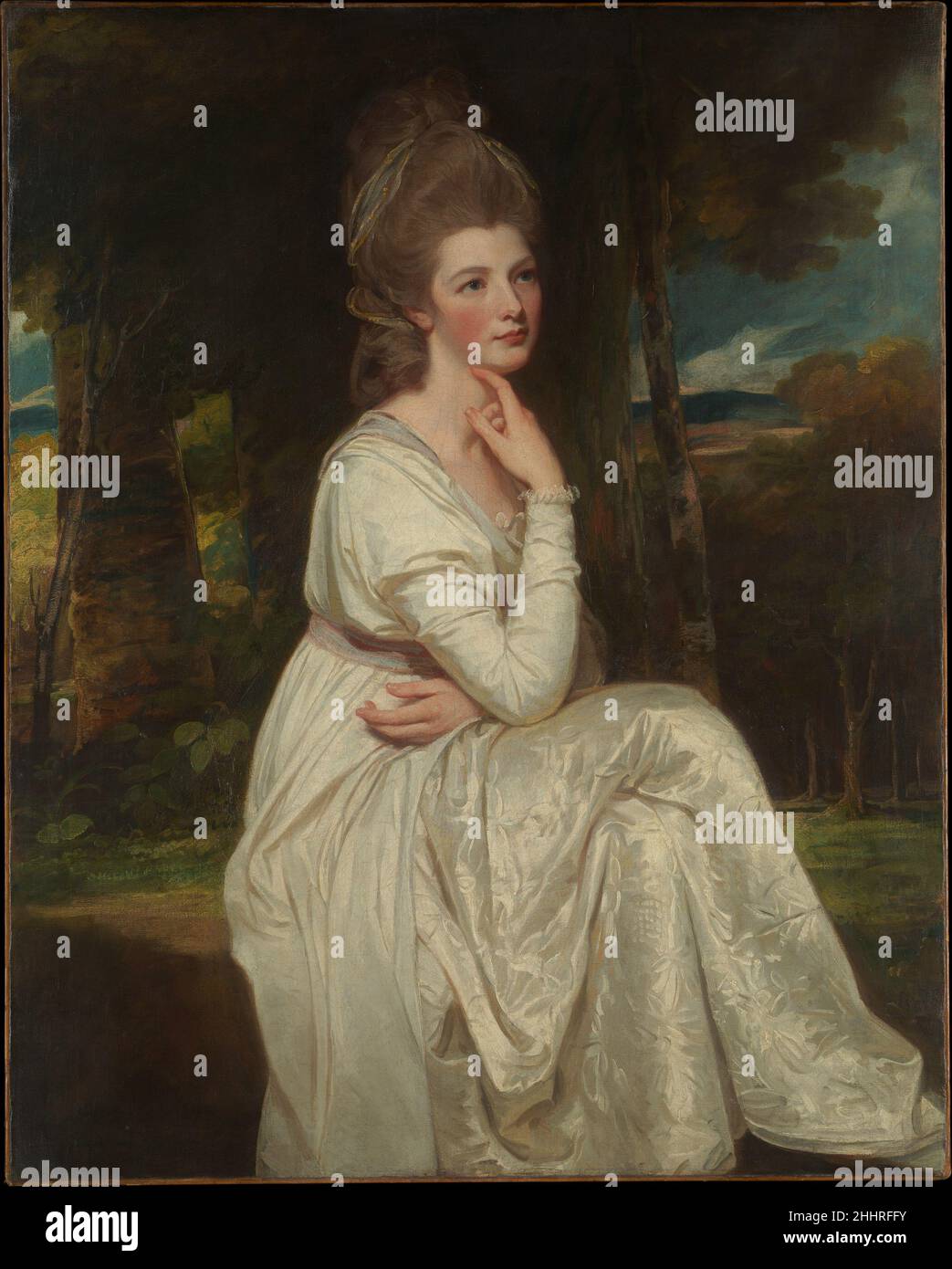 Lady Elizabeth Stanley (1753–1797), Countess of Derby 1776–78 George Romney British am 27. November 1776 saß Lady Derby zum ersten Mal für dieses Porträt. In den Wintern 1777 und 1778 kehrte sie zehnmal in Romneys Londoner Studio zurück. Sie war 23 Jahre alt und hatte einen Sohn und war zweieinhalb Jahre verheiratet. Der romantische Hintergrund und ihr weißes Kleid sind typisch für Romneys Frauenporträts. Hören Sie zu, wie Experten die Geschichte dieses Kunstwerks beleuchten Hörspiel oder Pause #409. The Age of Enlightenment unterstützt von Bloomberg Philanthropies Es tut uns leid, das Transkript für diesen Audiotrack ist nicht verfügbar Stockfoto