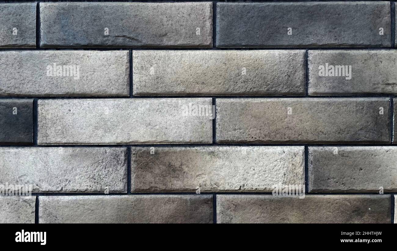Abstrakt braun grau Ziegelwand Textur für Tapetendesign, Loft-Stil. Stockfoto