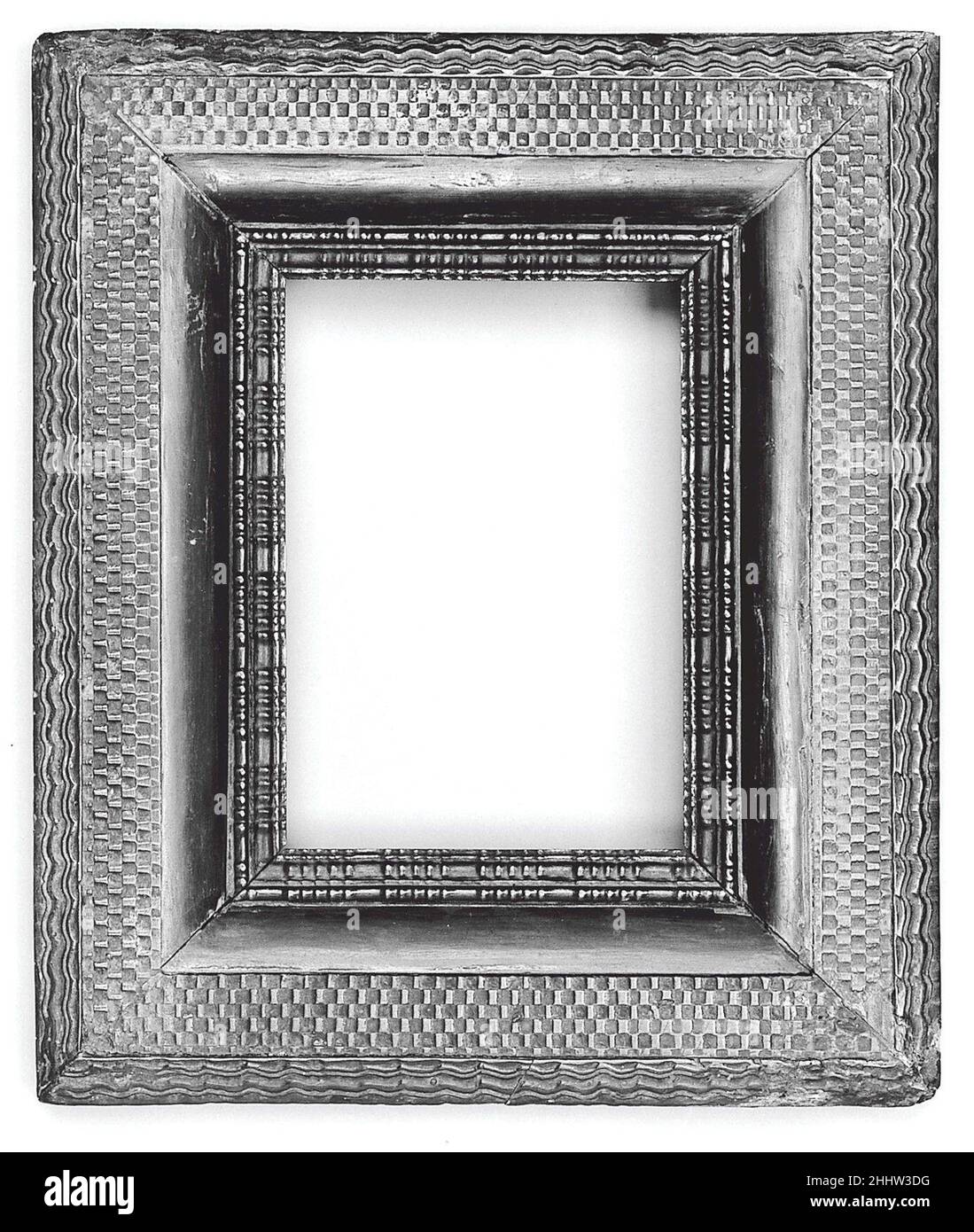 Reverse Welligkeit cassetta Rahmen Mitte 17th Jahrhundert mitteleuropäisch. Umgekehrte Welligkeit cassetta-Rahmen. Mitteleuropäisch. Mitte des 17th. Jahrhunderts. Kiefer Rückenrahmen mit aufgebrachten ebonisierten Perlholz obere Formteile.. Rahmen Stockfoto