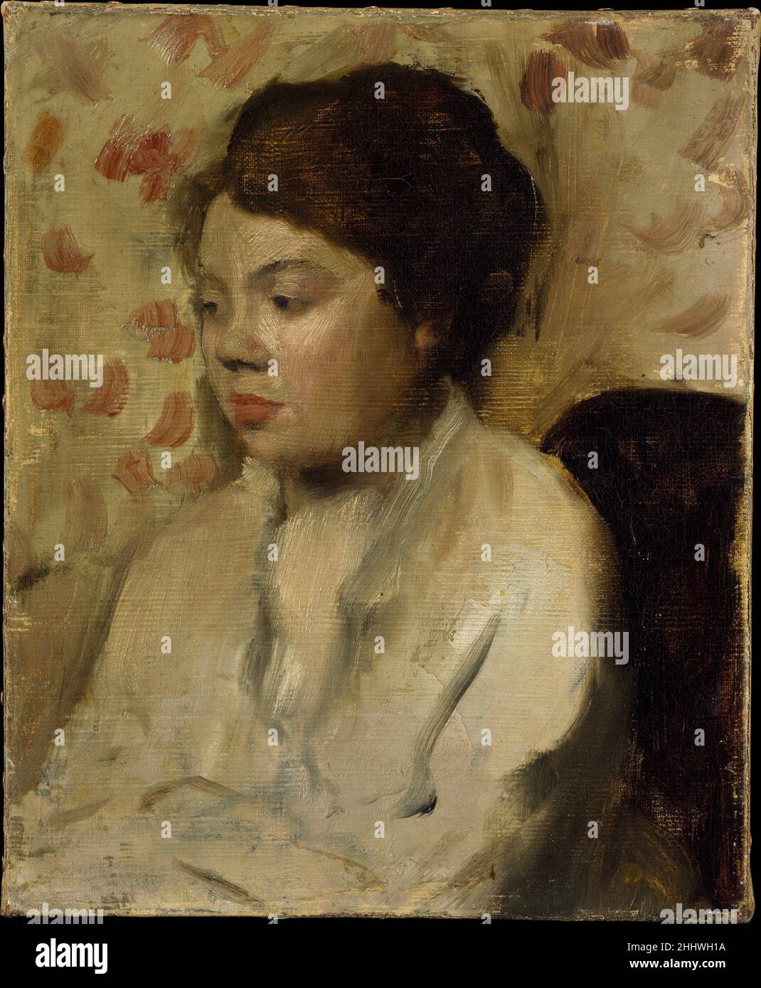 Porträt einer jungen Frau ca. 1885 Edgar Degas Französisch Dieses kleine Porträt scheint eine schnell ausgeführte Studie der Stimmung und des Figurentyps zu sein. Degas, die sich den Nuancen von Geste und Ausdruck sehr verbunden zeigte, konzentrierte sich darauf, den kontemplativen Blick der Frau einzufangen und ihr Kostüm und den Hintergrund in einer zusammenfassenden Weise zu behandeln. Porträt einer jungen Frau. Edgar Degas (Französisch, Paris 1834–1917 Paris). Ca. 1885. Öl auf Leinwand. Gemälde Stockfoto