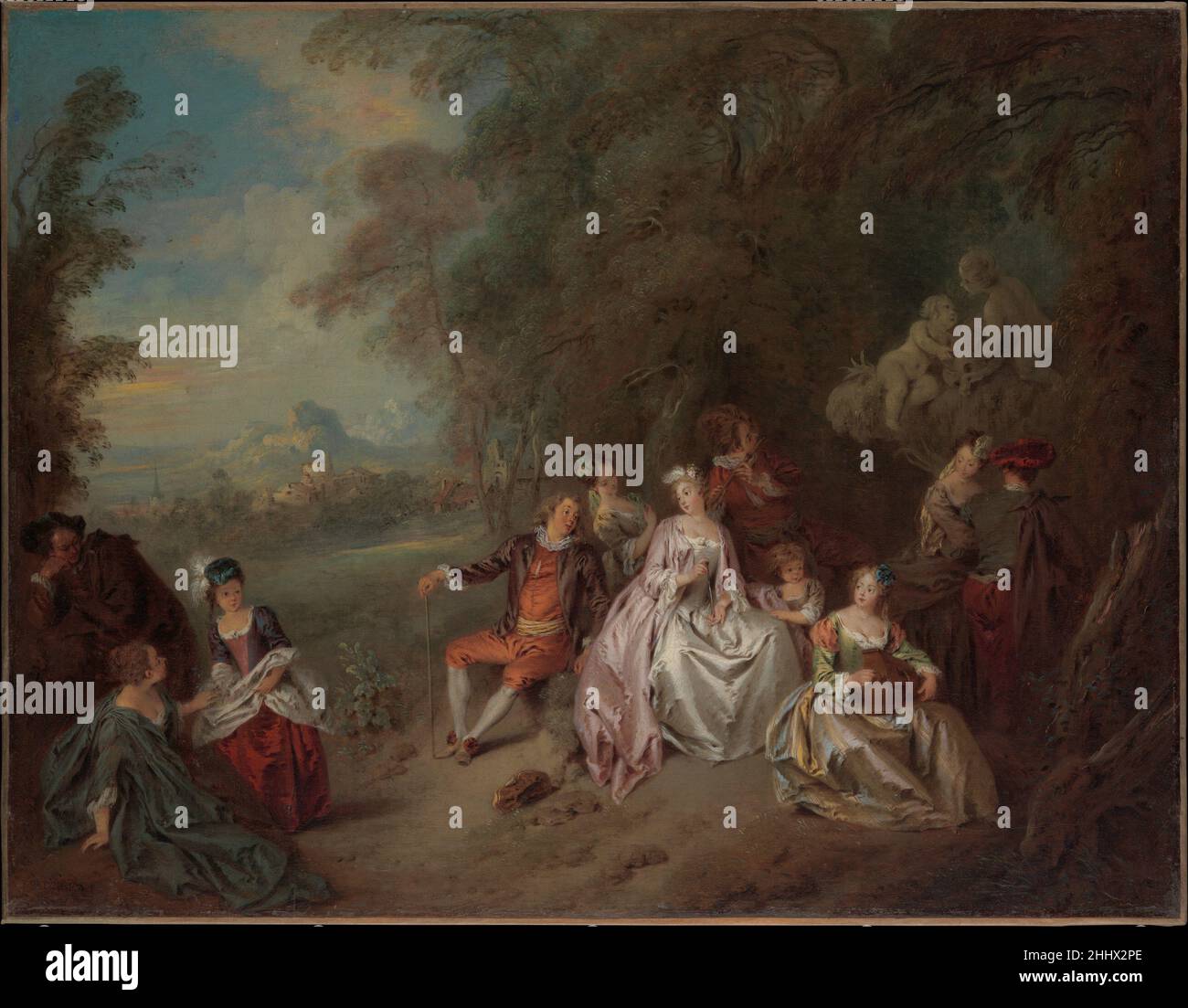 Konzert Champêtre ca. 1734 Jean-Baptiste Joseph Pater Französisch Diese zarte Pastelllandschaft mit eleganten Figuren illustriert, was Pater beklagte: Dass er Watteau alles verdankte. Die Damenkleider sind mehr oder weniger zeitgemäß, während die kurze Jacke, die Rüsche und die Schuhbänder des Mannes mit dem Gehstock an Kostüme für das Theater erinnern. Die Marmorputti mit einem Delphin muss Teil eines in Sträuchern versteckten Brunnens sein. Sie unterstreichen die spielerische Natur des Motivs. Das Gemälde ist eines von einem Paar. Der Anhänger, signiert und datiert 1734, befindet sich im Museo Thyssen-Bornemisza, Madrid. Stockfoto