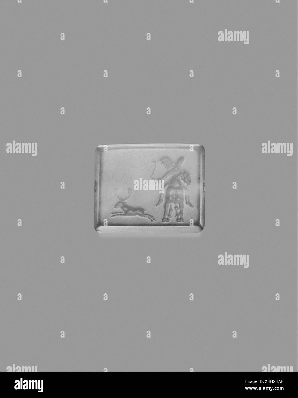 Facettierter Achat 2nd Hälfte des 5th. Jahrhunderts v. Chr. Graeco-persischer Reiter schießende Rentiere; Löwe; Rentiere; Antilope; Hyäne; Stier. Facettierter Achat 254625 Stockfoto