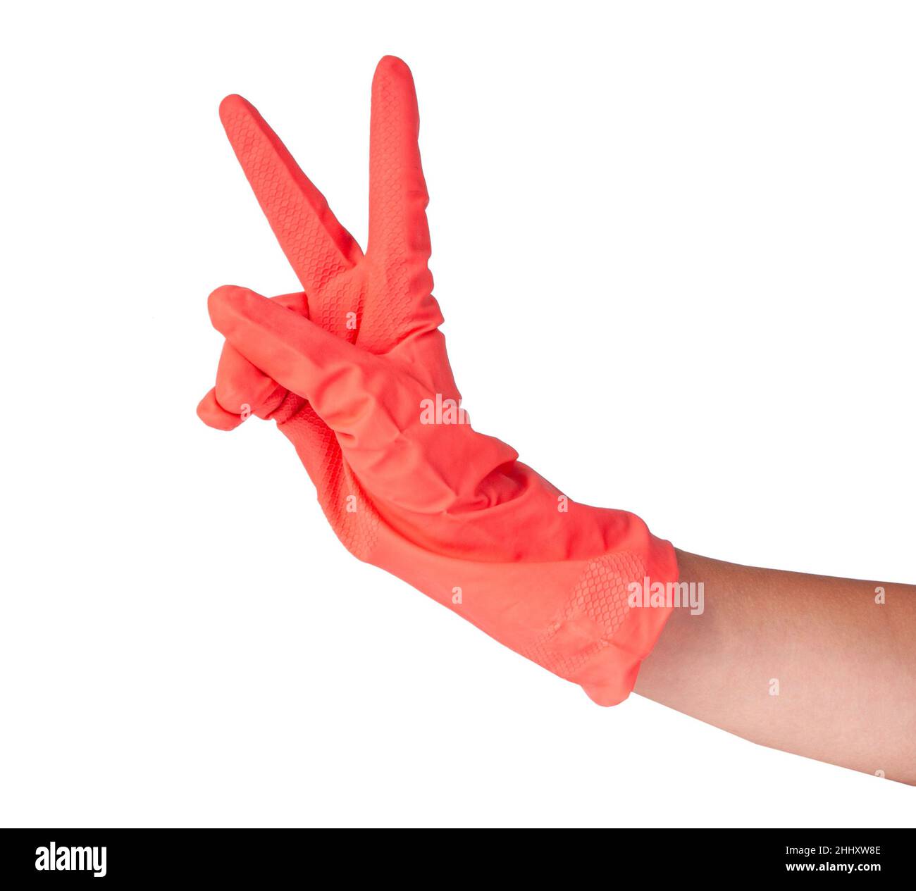 Rosa Gummihandschuh auf Frau Hand isoliert auf dem weißen Stockfoto