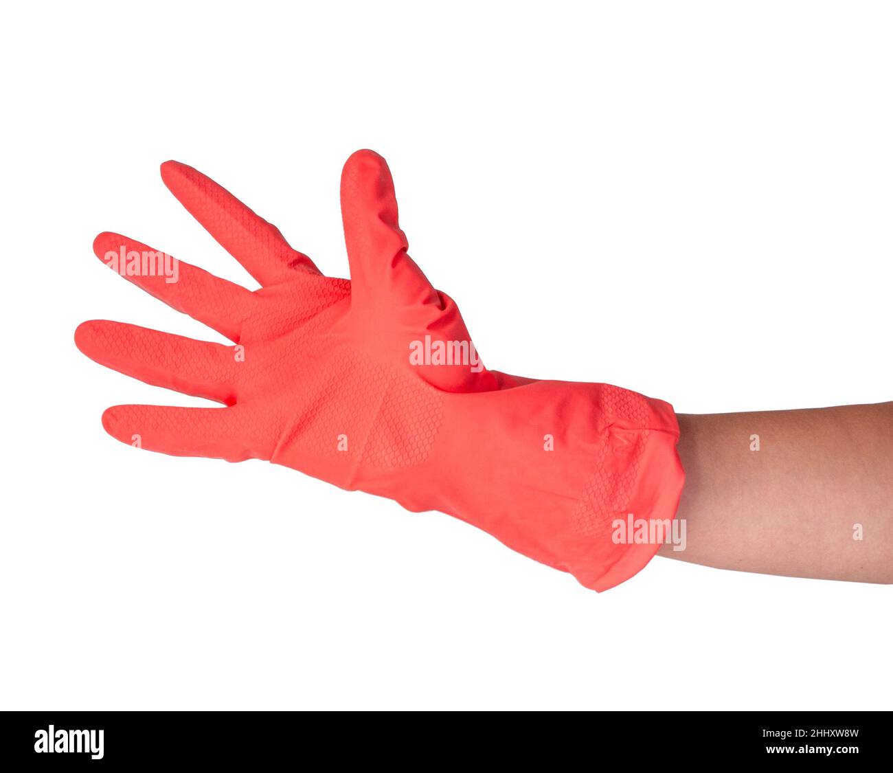 Rosa Gummihandschuh auf Frau Hand isoliert auf dem weißen Stockfoto