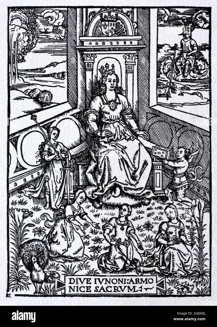 Anne von der Bretagne (1477-1514) Herzogin von der Bretagne und Königin Consort von Frankreich, dargestellt als die römische Göttin Juno auf einem Thron sitzend, wie Jean Lemaire de Belges (c1473-1525) in seinen Illustrationen des Gaules et Singularitez de Troye, veröffentlicht in den Jahren 1511-1512, dargestellt hat. Anfang c16th Holzschnitt, Gravur oder Illustration. Stockfoto