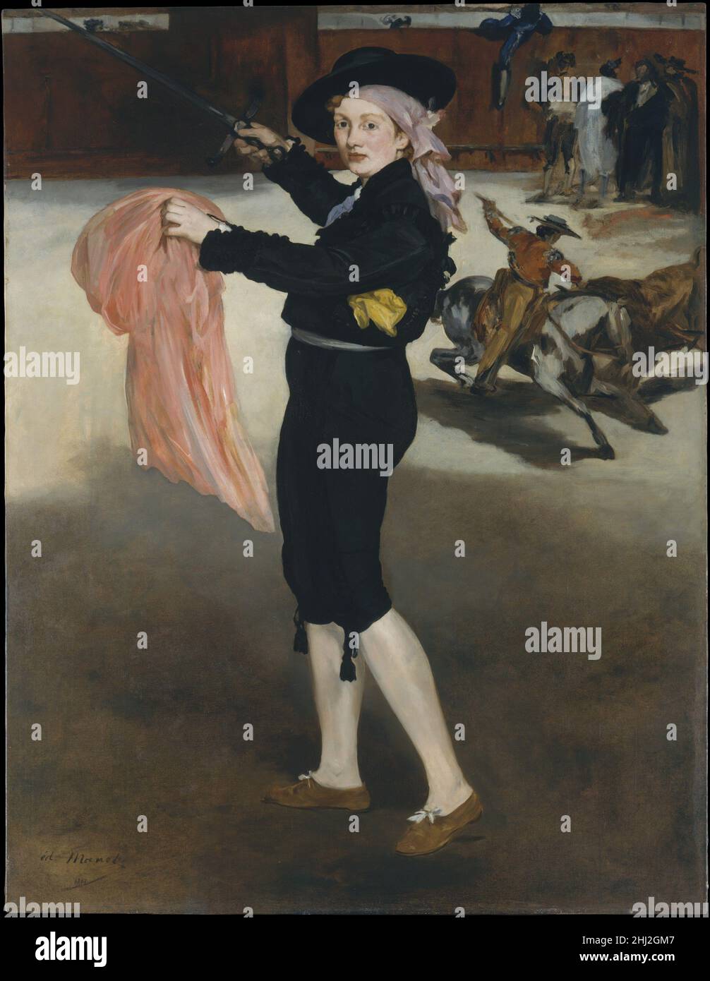 Mademoiselle V.. Im Kostüm eines Espada 1862 Edouard Manet French Manet stellte das Modell Victorine Meurent (1844–1927) in der Gestalt eines männlichen Espada oder Matador dar, das ihre Pose aus einem Renaissance-Druck entlehnte. Victorines Schuhe sind ungeeignet für Stierkämpfe, und der rosa Umhang, den sie blüht, ist der falsche Farbton, aber sie trägt ihre Rolle mit Geschrei aus. Die Kulisse zeigt eine Szene aus Goyas Tauromaquia-Serie, die die Heldentaten der Stierkämpfer feiert. Als dieses Gemälde im berüchtigten Salon des Refusés von 1863 ausgestellt wurde, bemerkte ein Kommentator: „Manet liebt Spanien und seine Lieblingsweiber Stockfoto