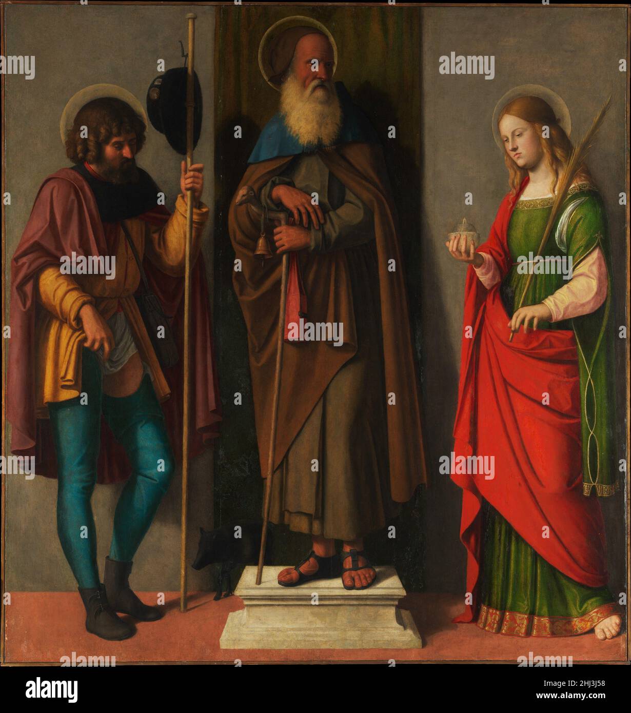 Drei Heilige: Roch, Anthony Abt und Lucy Ca. 1513 Cima da Conegliano (Giovanni Battista Cima) Italienisch aufgrund der erhöhten Stellung des Abtes des heiligen Antonius (ca. 251–356), flankiert von den Heiligen Roch (Schutzpatronin der Pest) und Lucy (Schutzpatronin der Blinden: Sie hält eine Öllampe), könnte dieses Altarbild um 1513 für die Brüder des heiligen Antonius gemalt worden sein, die den Pestopfern dienten. Als Werk Bellinis gehörte es der Kaiserin Josephine Bonaparte, was den anhaltenden Ruf von Cima’s wahrscheinlicher Lehrerin bezeugt. Drei Heilige: Roch, Anthony Abt und Lucy 435902 Stockfoto