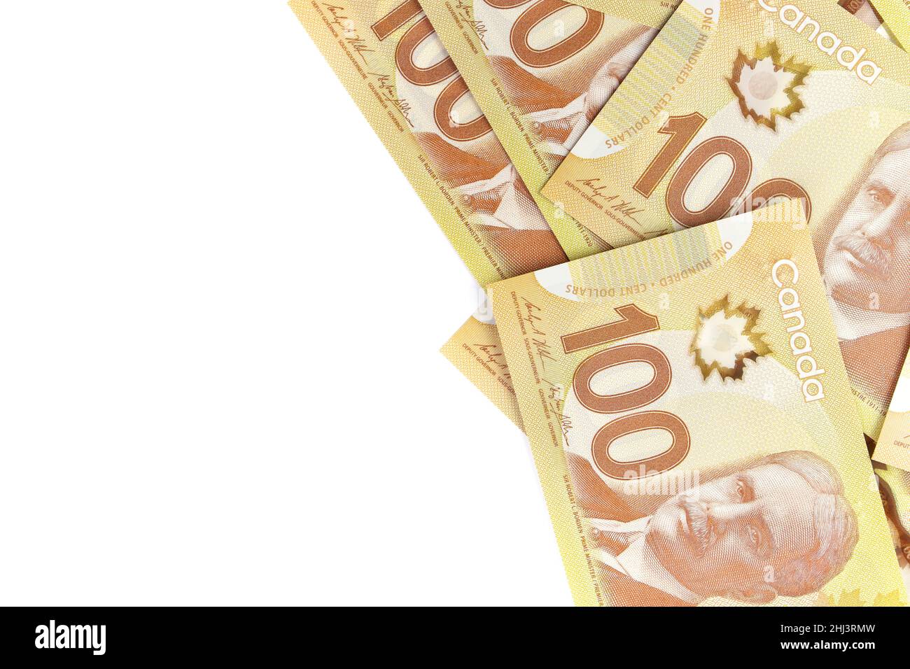 Direkt über dem Bild von Crisp Canadian 100 einhundert-Dollar-Scheinen auf weißem Hintergrund Stockfoto
