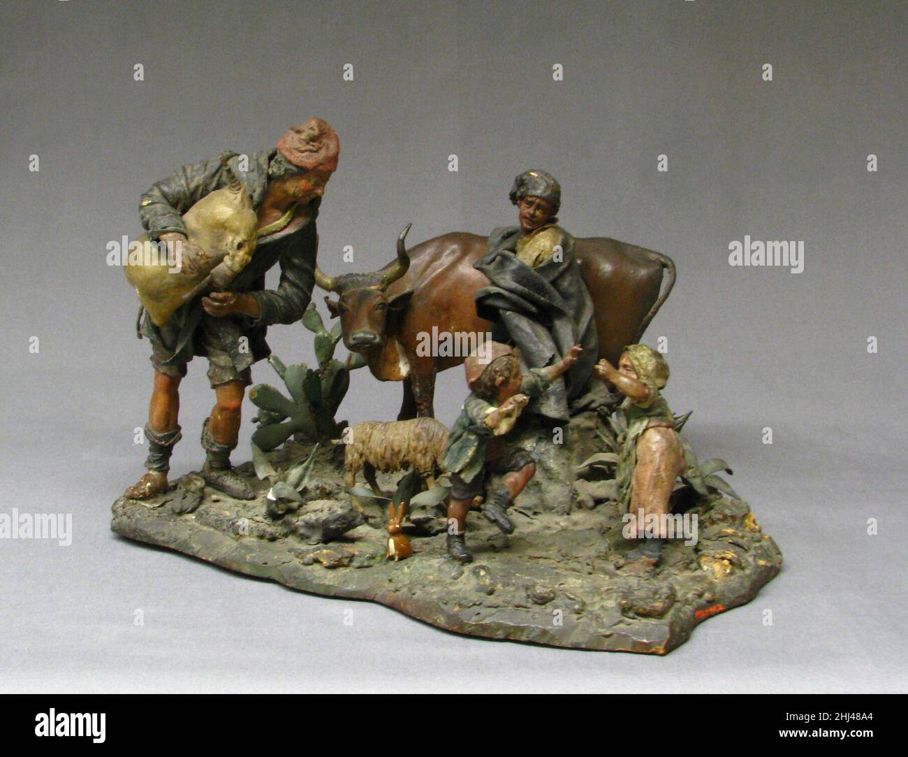 Gruppe von rustikalen Figuren 18th Jahrhundert Italienisch, Sizilien die Natur der sizilianischen crèche Technik ist sehr verschieden von der der Neopolitan. Letzteres ist das Werk zahlreicher Hände nicht nur bei der Herstellung der Figuren selbst, sondern auch in ihrer Orchestrierung innerhalb der versammelten crèche. Sizilianische Figuren hingegen, obwohl rauer im Finish, werden vollständig von den einzelnen Künstlern angefertigt, die nicht nur ihre Kleidung Formen, sondern auch die Gruppierung der Figuren in separaten Vignetten kontrollieren. Gruppe von rustikalen Figuren 208166 Stockfoto