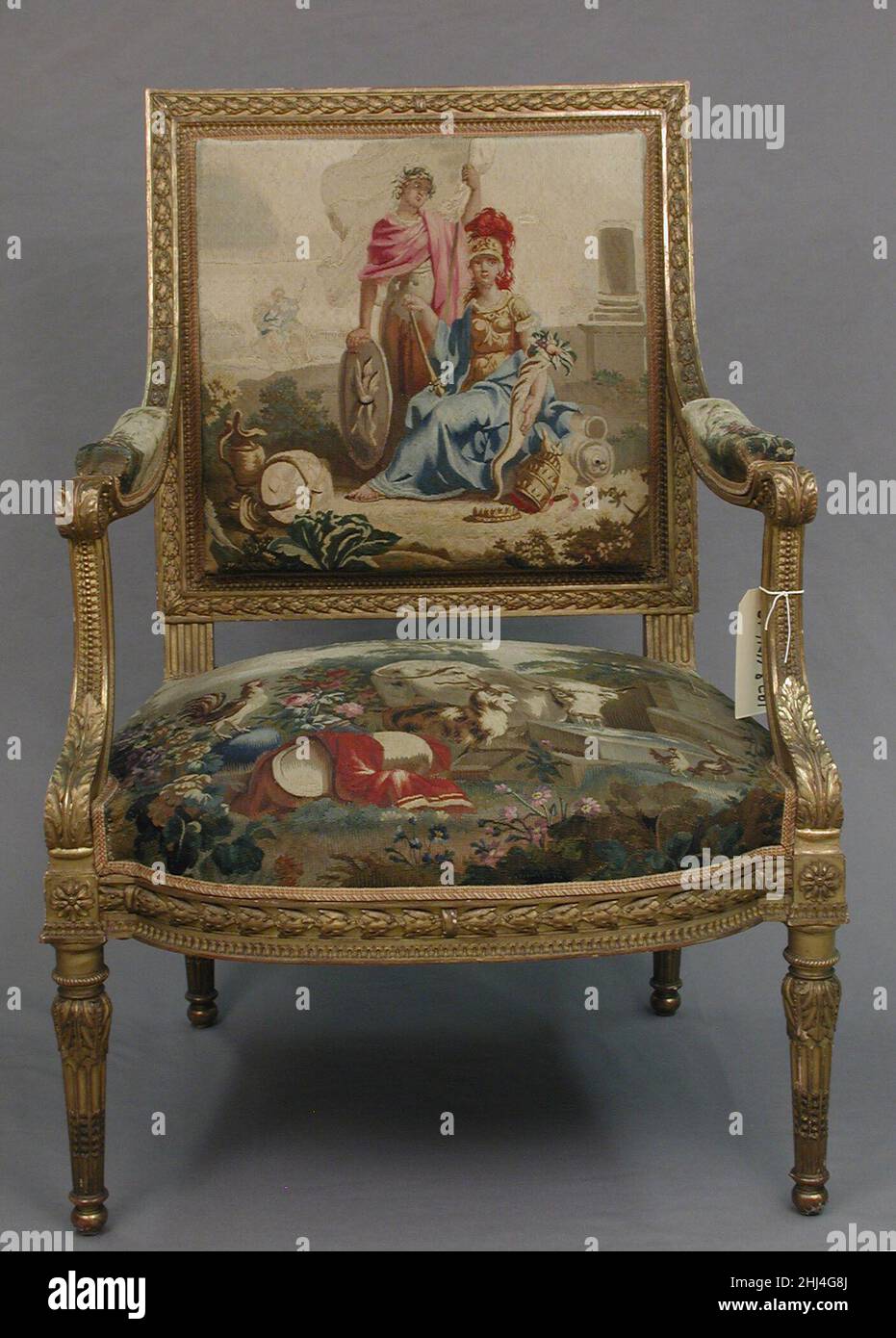 Sessel gestaltet ca. 1786, gewebt 1790–91; Stuhlgestell zweite Hälfte 19th Jahrhundert Tapisserie von Beauvais Dieses Ensemble gehört im Auftrag von Louis XVI. Zu einem Satz von vier Wandbehängen (1978.404.1–.4) und 56 Möbelpolstern (1978.404.5a–c–.18a–c), die die vier Kontinente darstellen: Amerika, Europa, Asien und Afrika. Sessel 231934 Stockfoto