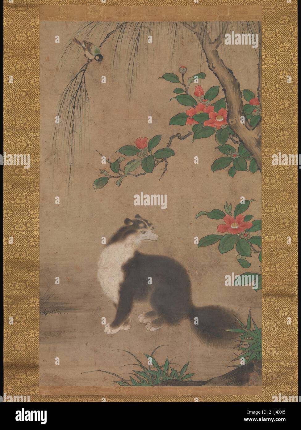 Moschuskatze Mitte bis Ende des 16th. Jahrhunderts Uto Gyoshi Eine flauschige schwarz-weiße Moschuskatze hält an einem späten Wintertag neben einer blühenden roten Kamelie inne und tut sein Bestes, um die aufgeregte Titmaus auf einem Weidenweide über ihm zu ignorieren. Obwohl sie nicht aus Japan stammten, waren Moschuskatzen (jakōneko) oder Civets in Japan durch frühe chinesische Gemälde bekannt, die ab dem 1200s importiert wurden. Diese nächtlichen, katzenartigen Säugetiere wurden zu einem bevorzugten Thema von Künstlern, die mit der beeindruckenden Kano-Schule verbunden waren, die Ende 1400s in Kyoto gegründet wurde. Ein großes quadratisches Siegel unten rechts nennt den Maler dieses Werkes Uto Gyosh Stockfoto