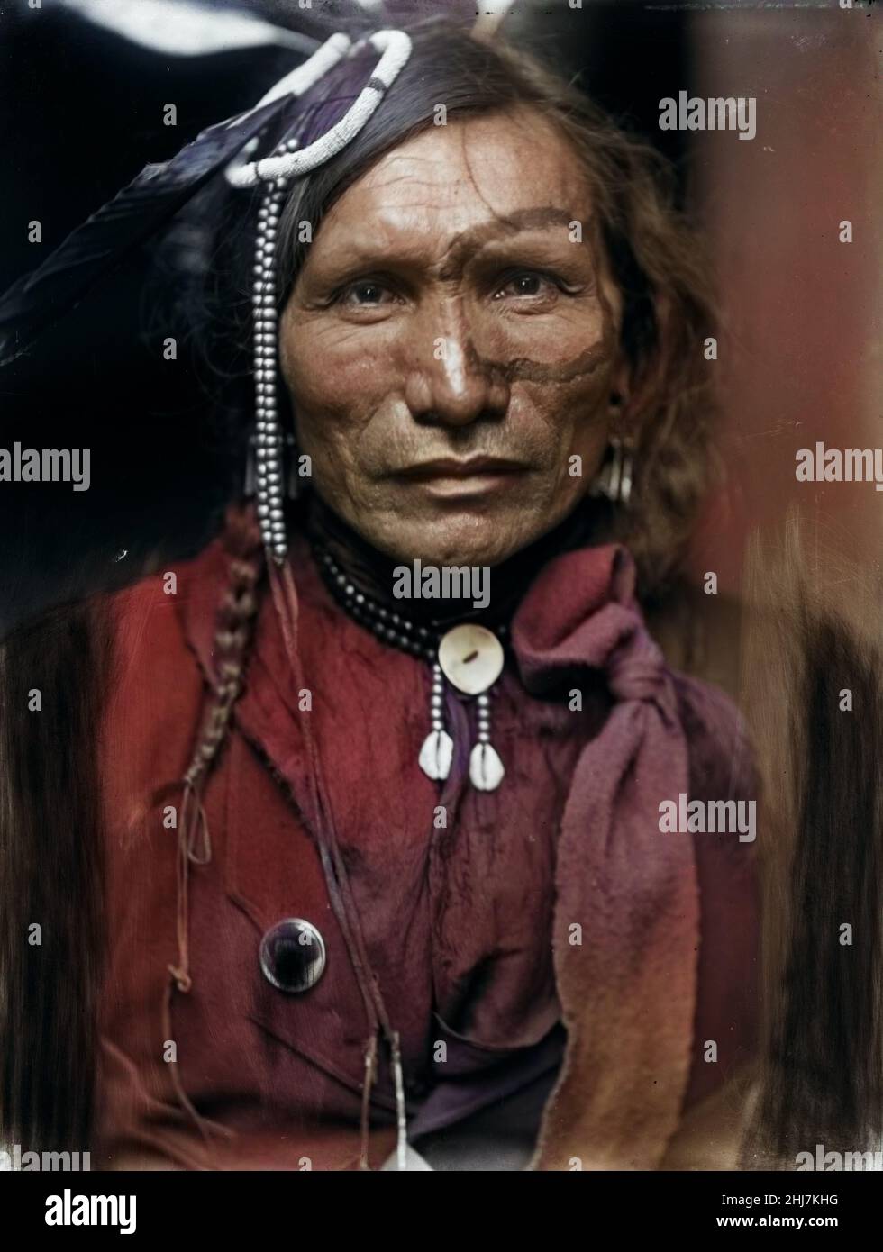 Iron White man, ein Sioux-Indianer aus Buffalo Bills Wild West Show, c 1900. Käsebier, Gertrude, 1852-1934, Fotografin. Eingefärbt. Stockfoto