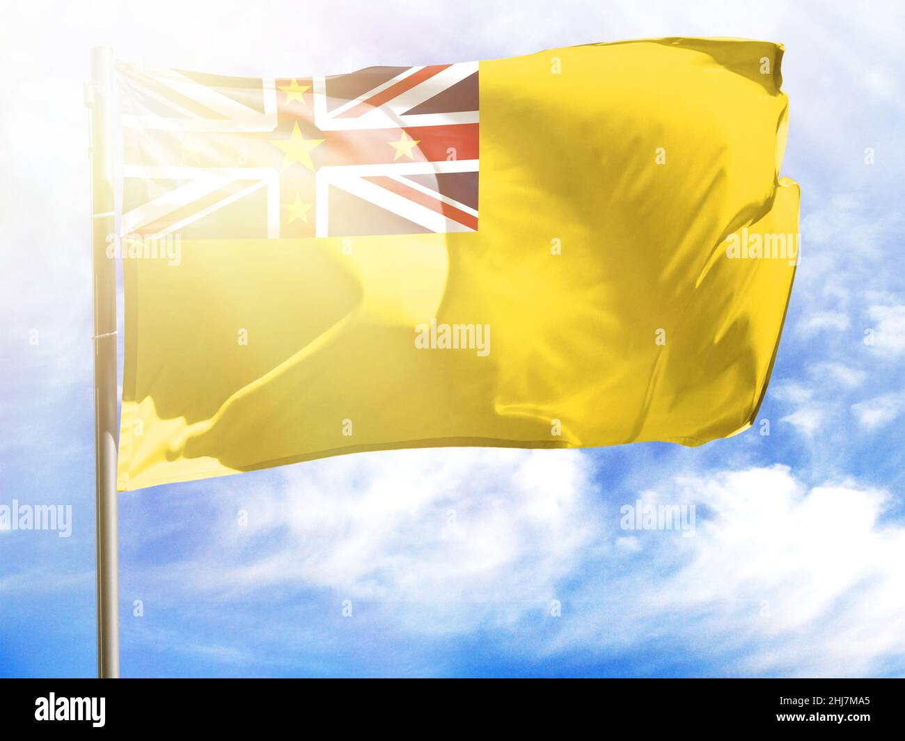 Fahnenmast mit Flagge von Niue. Stockfoto