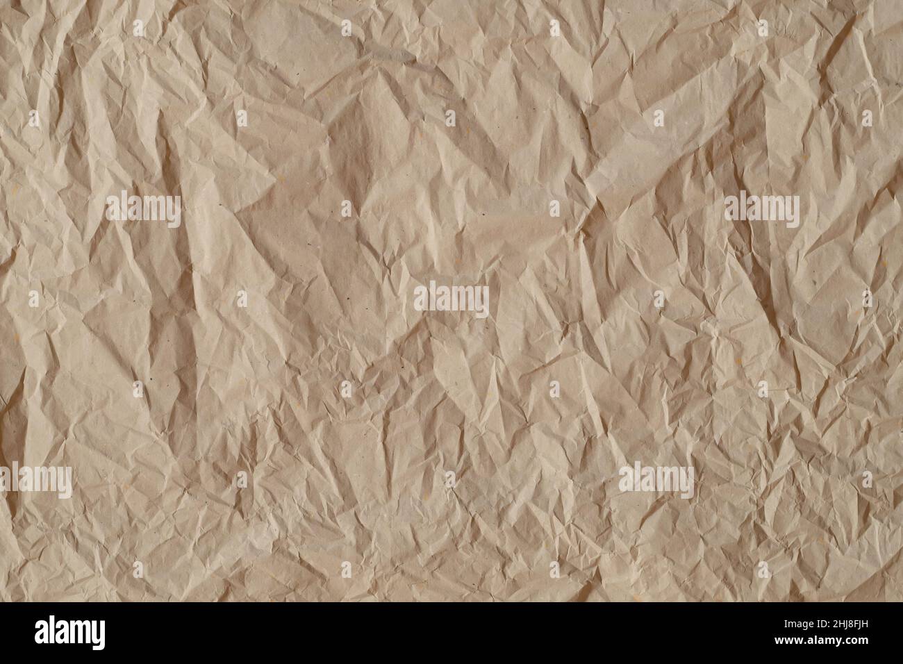 Zerknittertes braunes Papier, abstrakter Hintergrund oder Textur Stockfoto