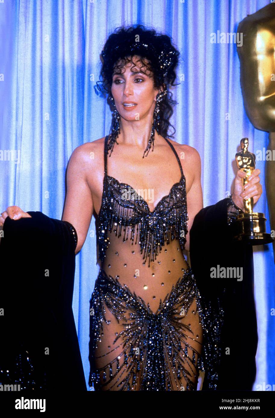 Cher bei den Academy Awards für die beste Schauspielerin für Moonstruck, 1988. Kredit: Ron Wolfson / Rock Negative / MediaPunch Stockfoto