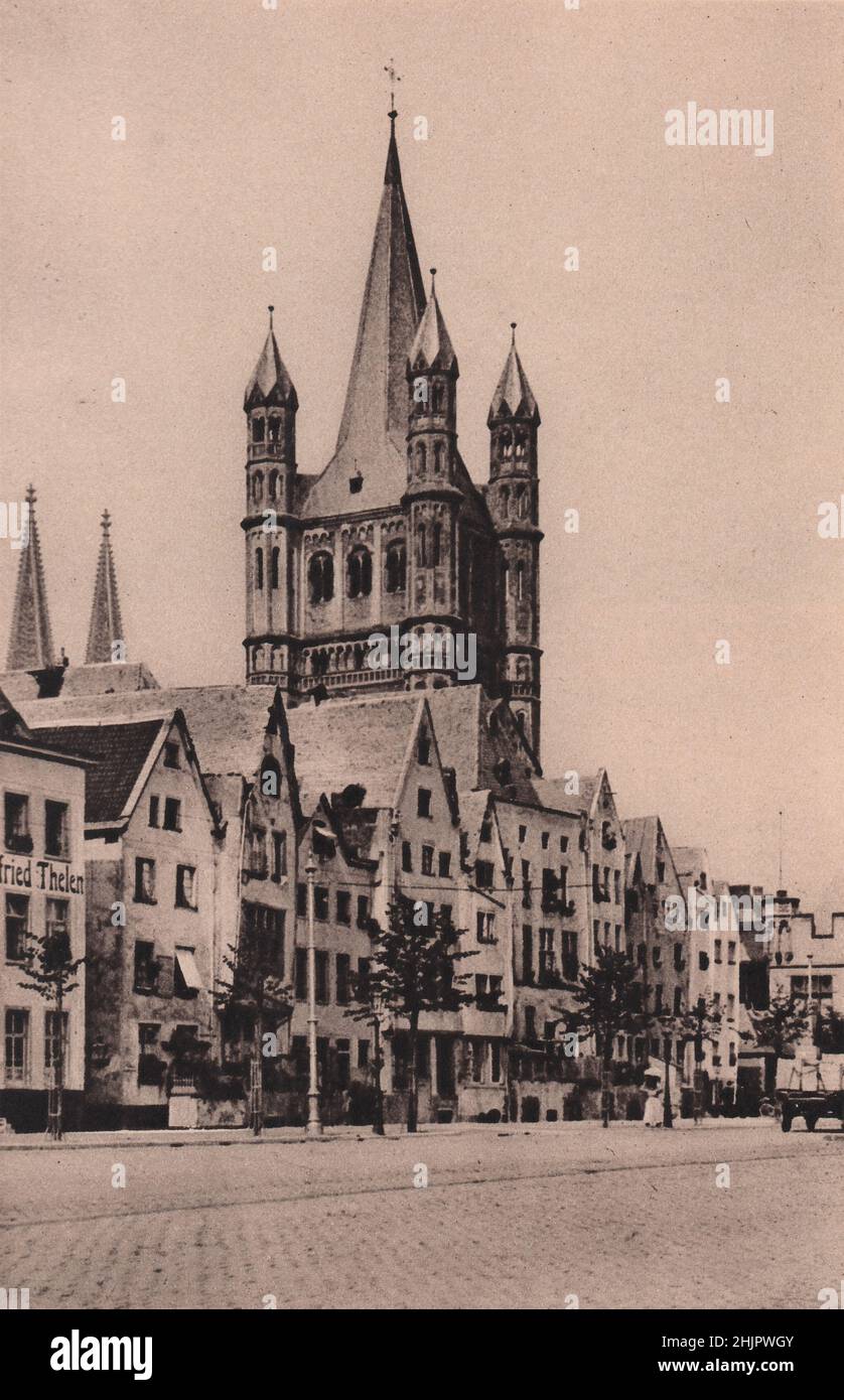 In der Zollstraße, in der Nähe des Alten Marktes, befindet sich diese schöne Kirche von Gross S. Martin, die im 12. Jahrhundert umgebaut wurde. Deutschland. Köln (1923) Stockfoto