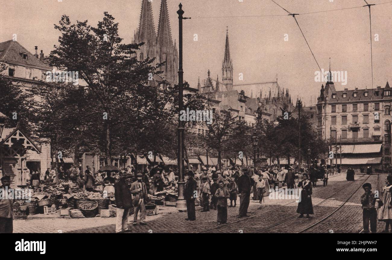 Dominiert von der Kathedrale, dem Alten Markt oder dem alten Markt mit seiner Statue und dem Renaissance-Brunnen. Köln (1923) Stockfoto