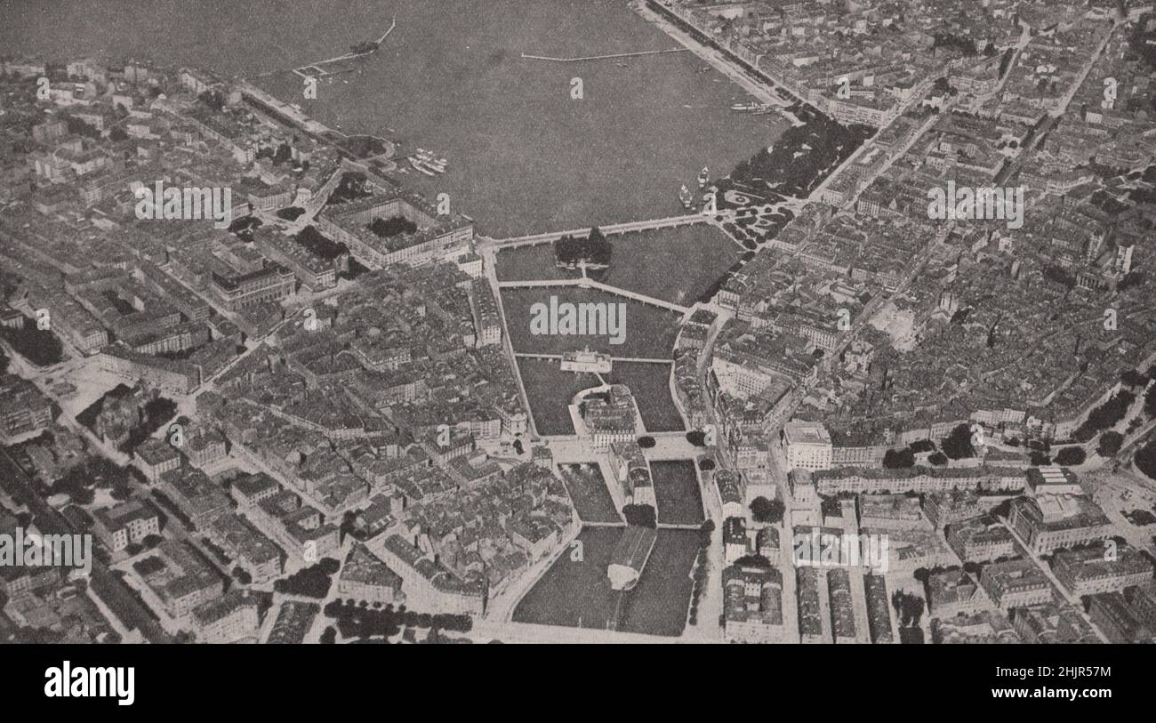 Auffallendes Schauspiel von Genf, das wie eine Reliefkarte unter dem Flügel des Flugzeugs liegt. Schweiz (1923) Stockfoto