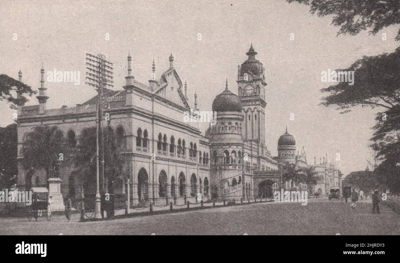 Kuala Lumpur: Uhrenturm über den Regierungsgebäuden. Malaysia. Malaya (1923) Stockfoto