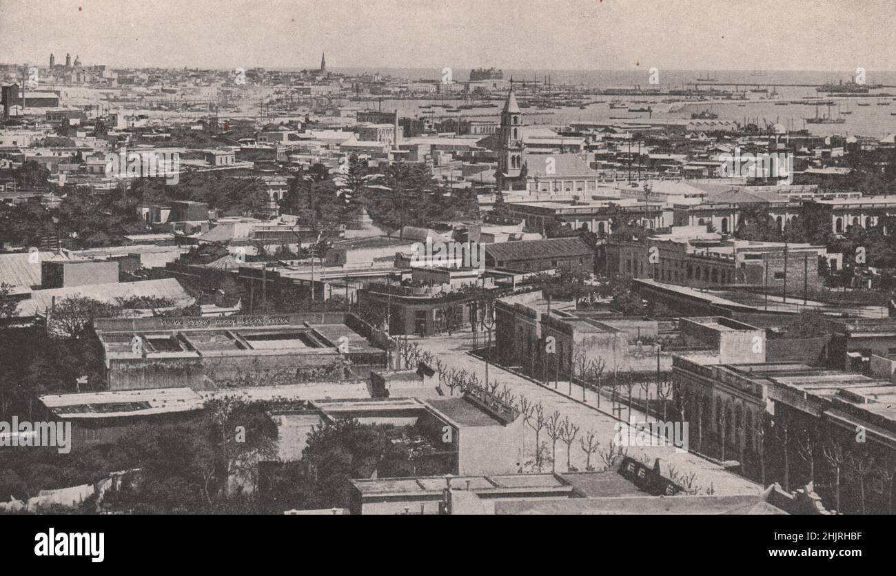 Verdrängte Gebäude von Montevideo säumen die Bucht und den herrlichen Innenhafen. Uruguay (1923) Stockfoto
