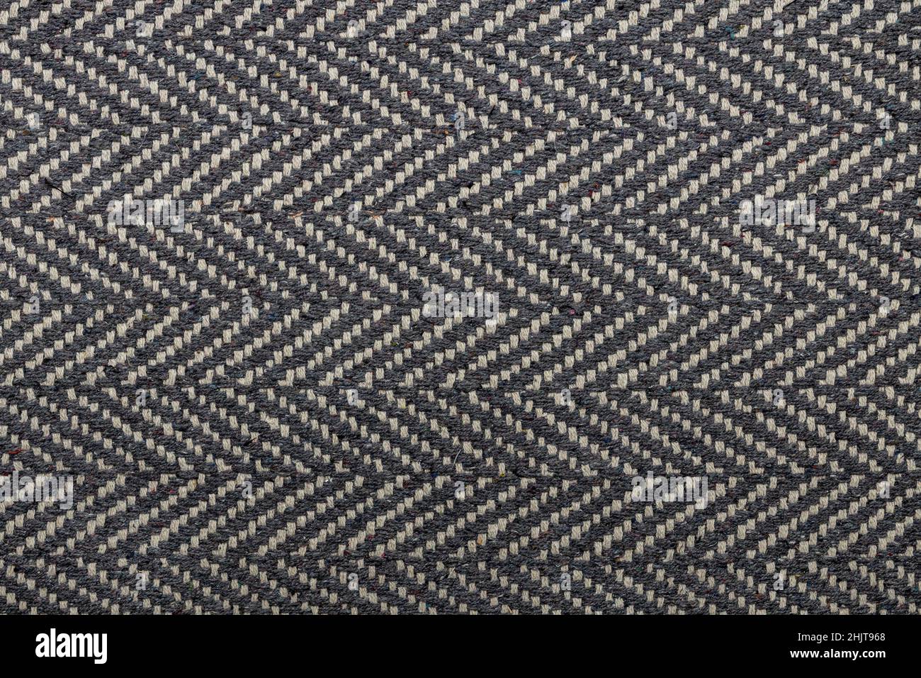 Grau und weiß gemusterte Textur Nahaufnahme. Stockfoto