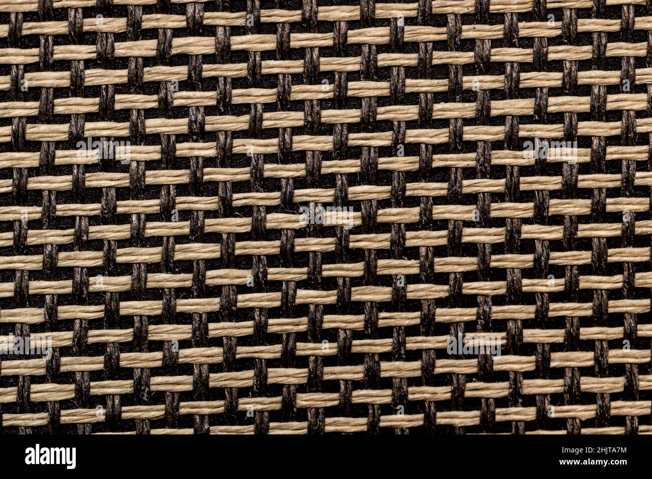 Braun und gelb gewebte Stoffstruktur Nahaufnahme. Stockfoto