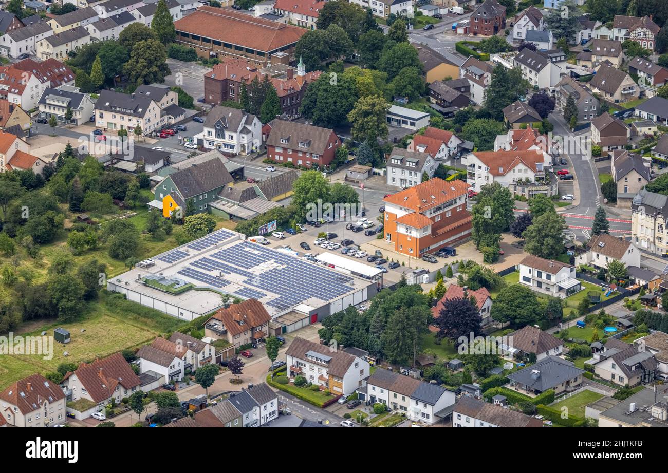 Luftbild, Rewe-Supermarkt mit Solardach, Massener Hellweg, Schillerschule, Massen, Unna, Ruhrgebiet, Nordrhein-Westfalen, Germa Stockfoto