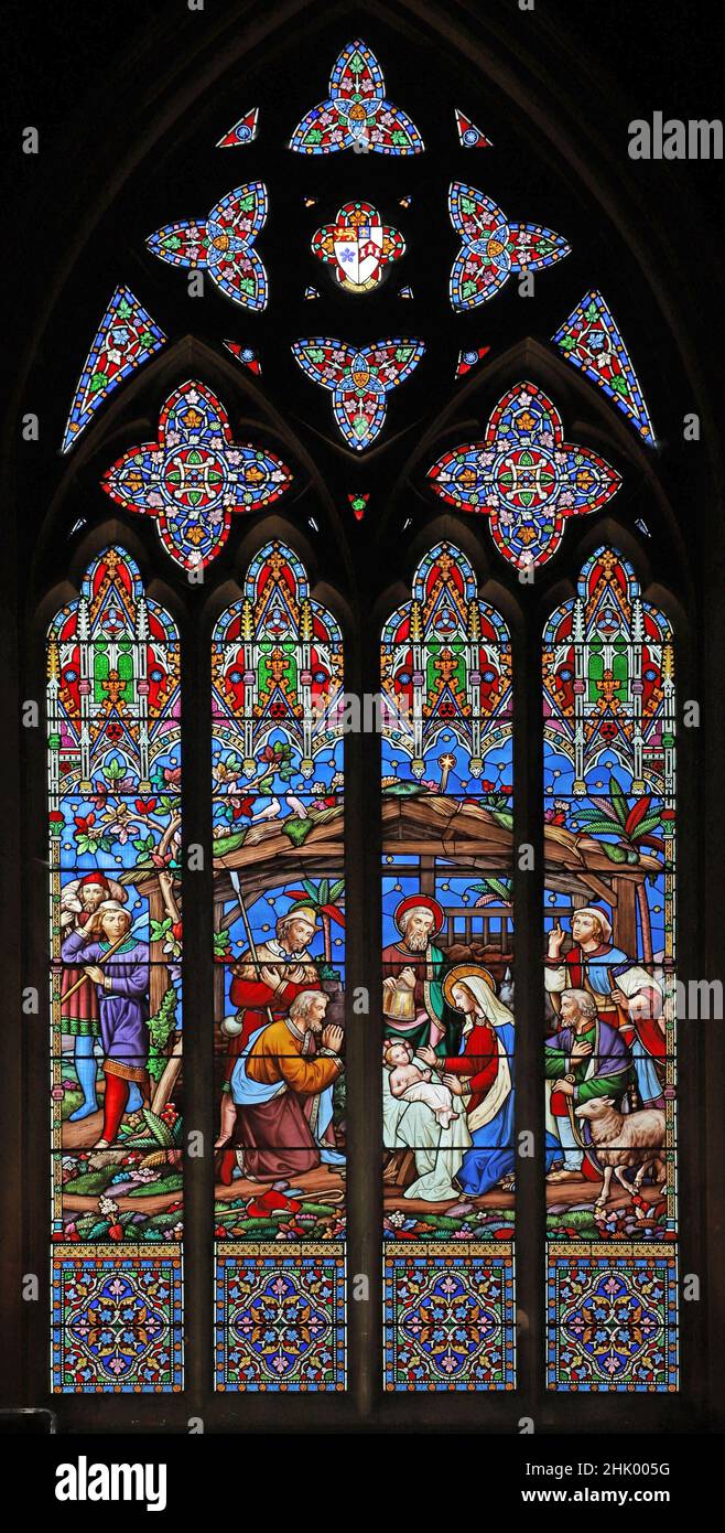 Ein Buntglasfenster von William Wailes, das die Geburt Christi darstellt; Anbetung der Hirten, Christ Church, Swindon, Wiltshire Stockfoto