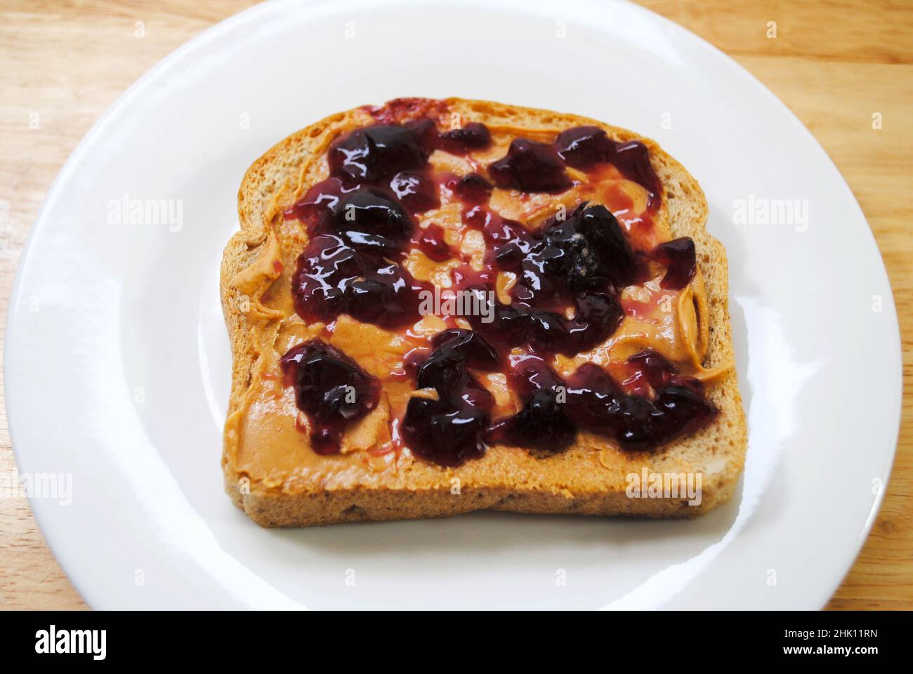 Vorbereitung einer Erdnussbutter und Marmelade-Sandwich Stockfoto
