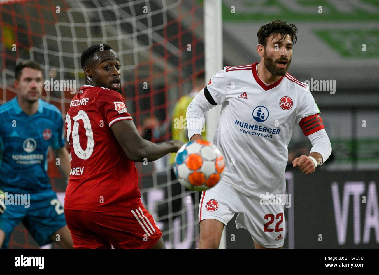 Merkur Spielarena Düsseldorf Deutschland 21,1.2022, Fußball: Bundesliga-Saison 2nd 2021/22, Spieltag 20. , Fortuna Düsseldorf (F95, rot) vs. 1. FC Nürnberg (FCN, weiß) - Khaled Narey (F95), Enrico Valentini (FCN) Stockfoto