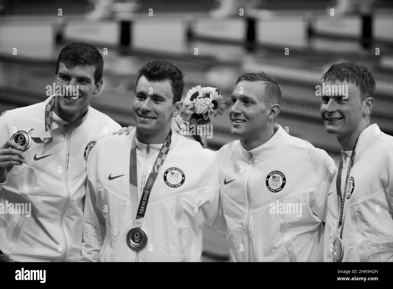 26th. JULI 2021 - TOKIO, JAPAN: Caeleb Dressel, Blake Pieroni, Bowe Becker und Zach Apple aus den USA gewinnen die Goldmedaille in der Männer-Freestyle von 4x100 m Stockfoto