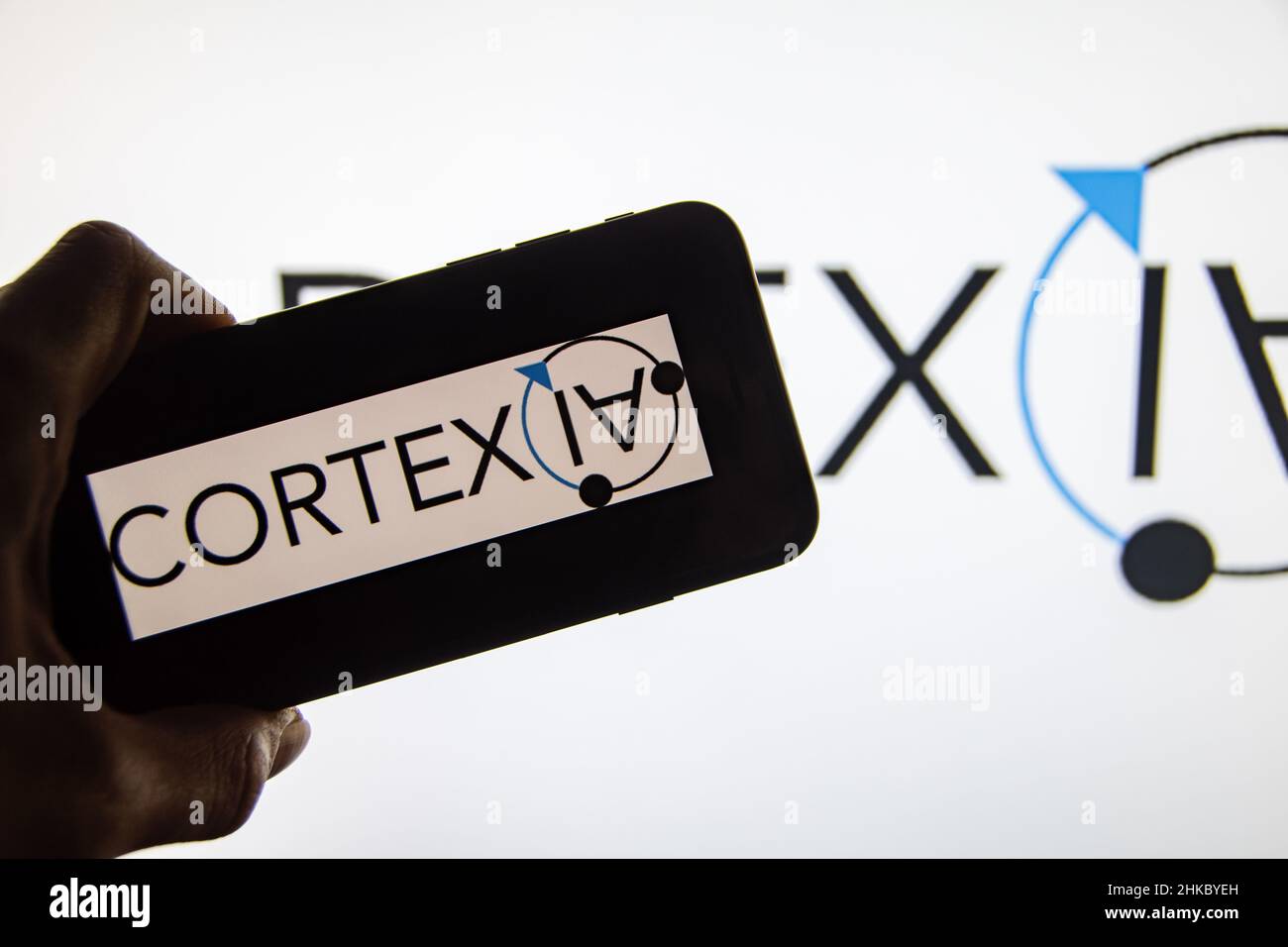 Rheinbach, Deutschland 2. Februar 2022, das Markenlogo des Schweizer Softwareentwicklers 'Cortexia' auf dem Display eines Smartphones (Fokus auf Markenlogo) Stockfoto