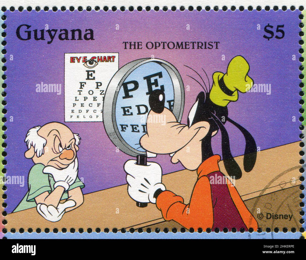 GUYANA - UM 1995: Briefmarke gedruckt von Guyana, zeigt Walt Disney Figuren, Goofy, um 1995 Stockfoto